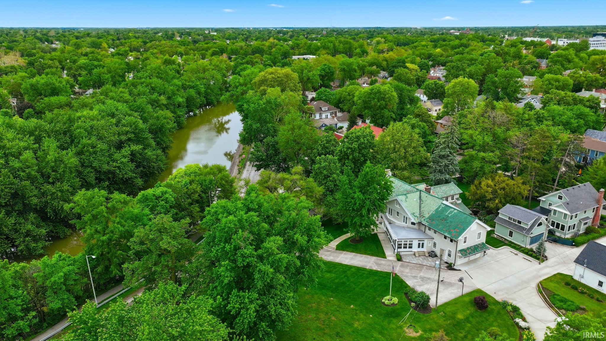 Expansive green landscape with a river feature