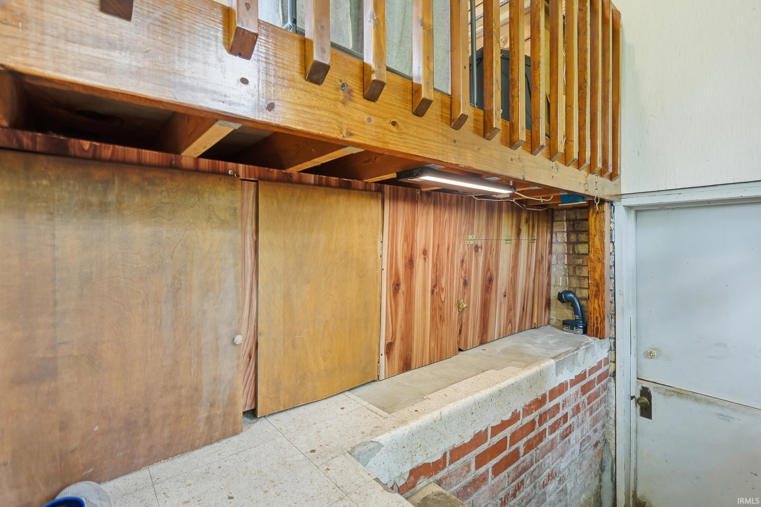 Upper-level wood railing and support beams