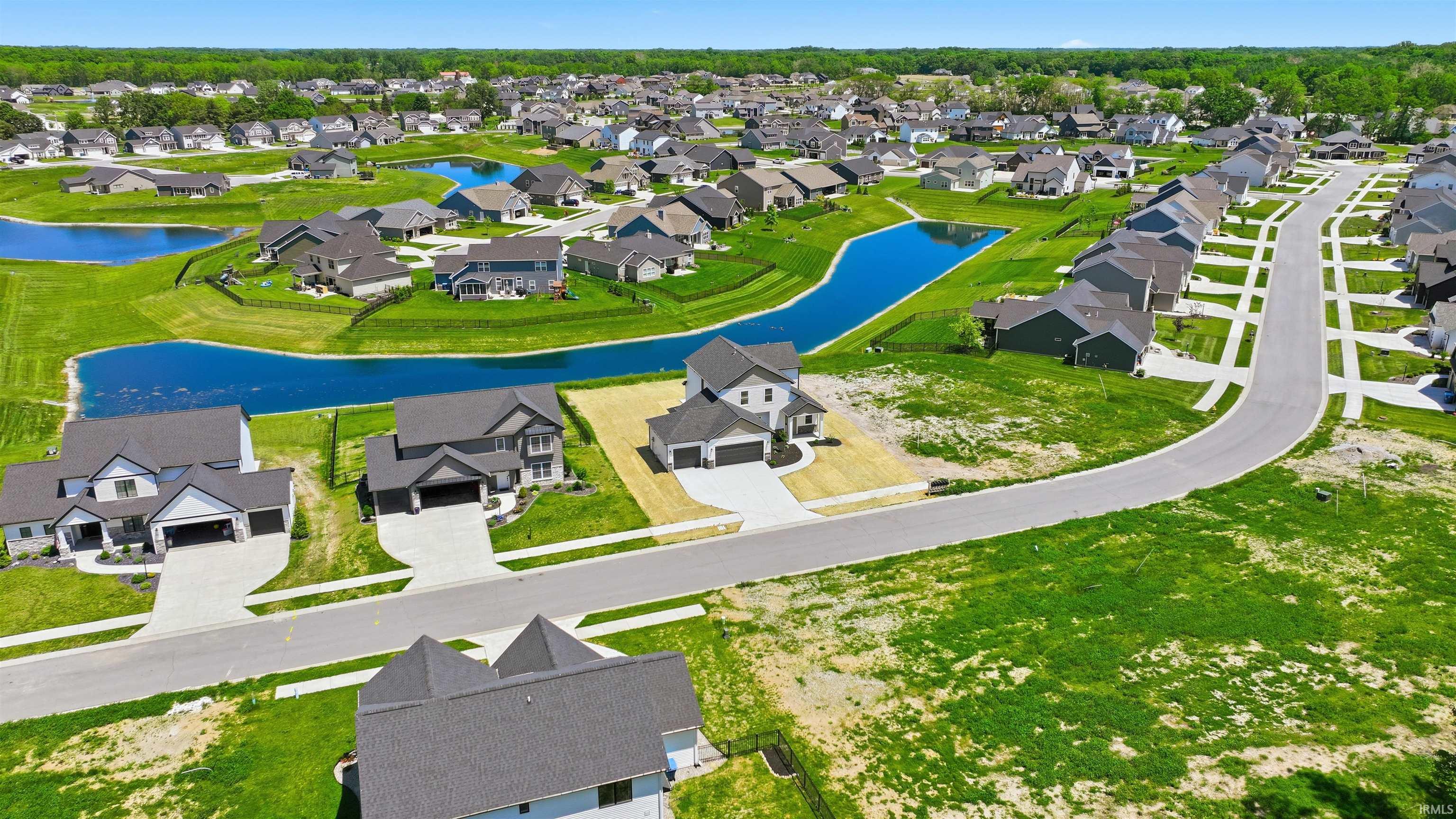 New construction residential community featuring a paved street system, sidewalks, and established homesites