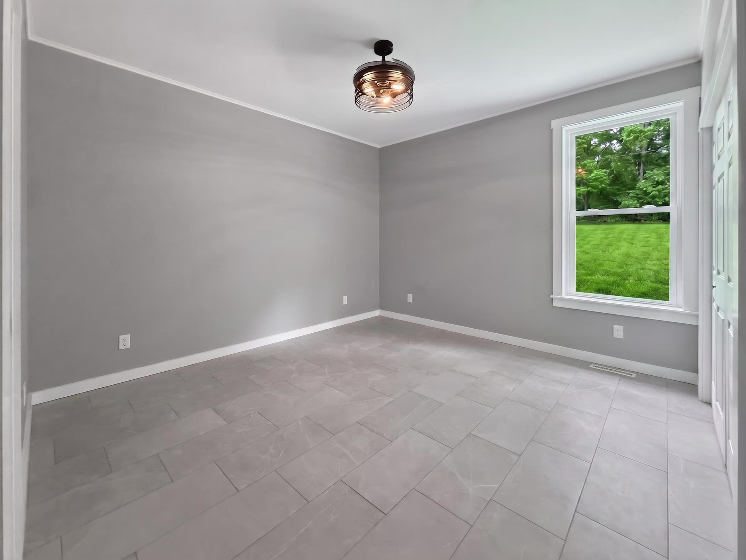 Neutral gray walls complemented by white trim and a white ceiling