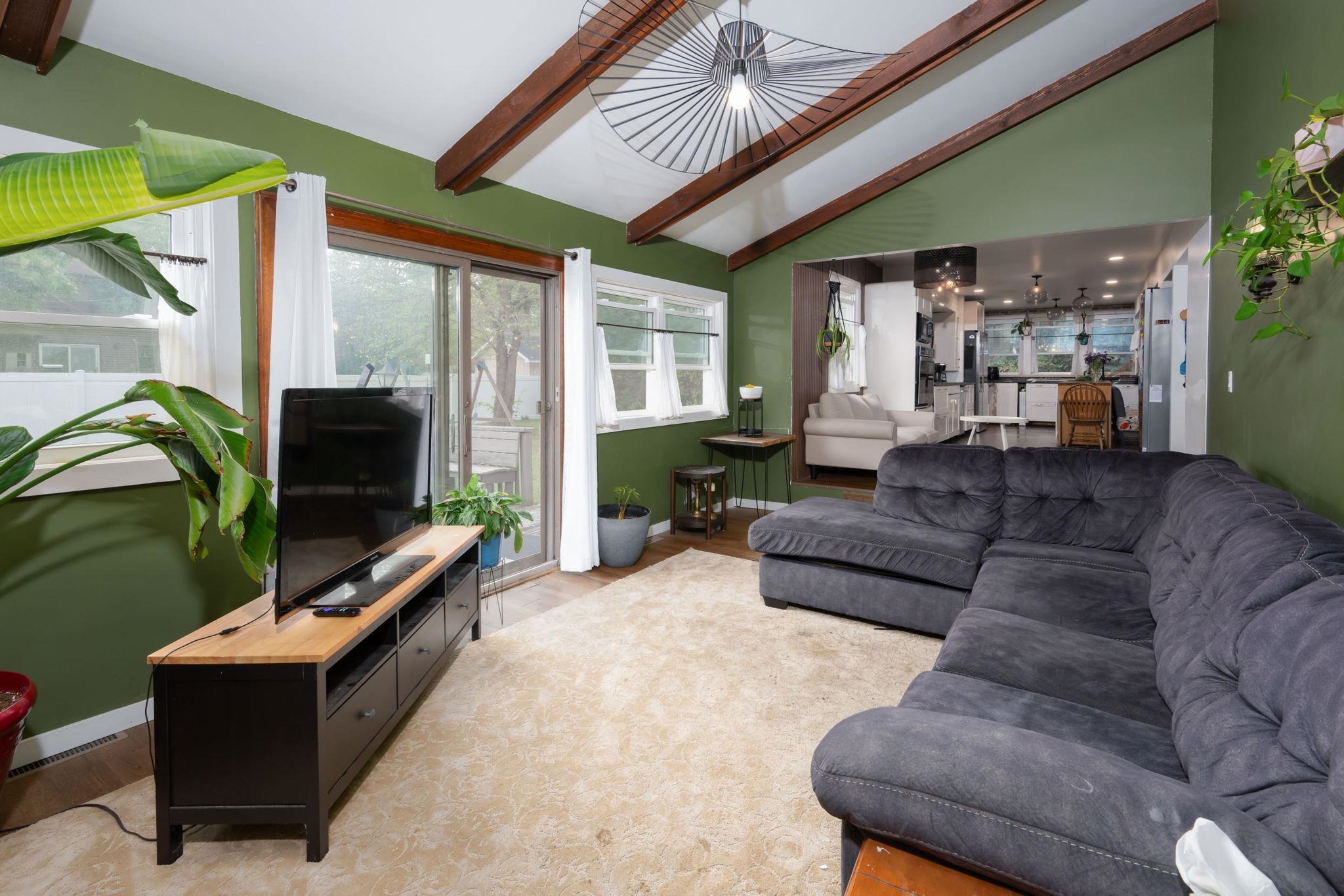 Vaulted ceiling with exposed wood beams