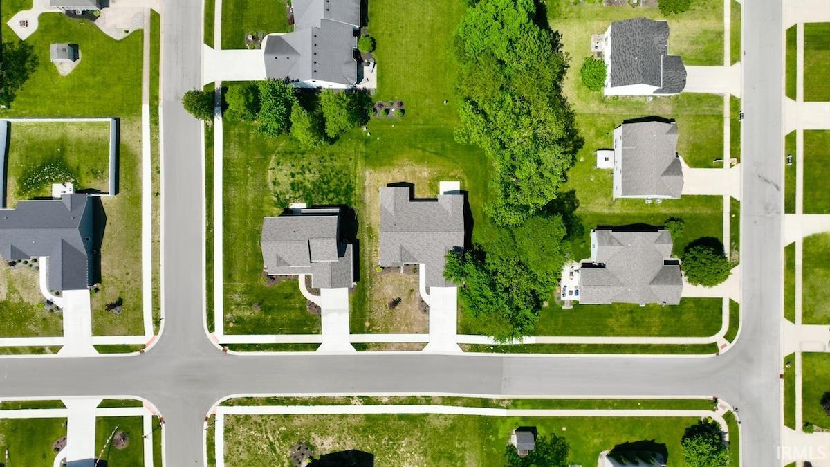 Aerial perspective showcasing a residential neighborhood with a consistent architectural aesthetic