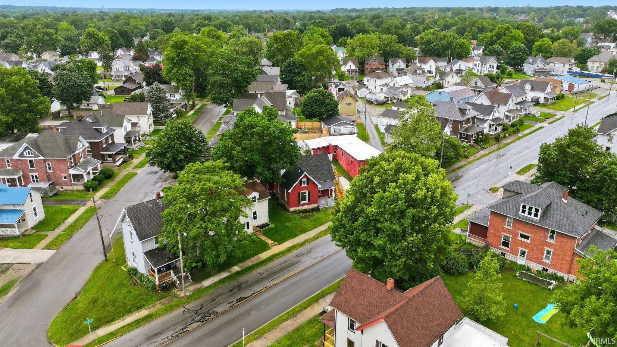 Residential streets featuring various architectural styles and mature trees