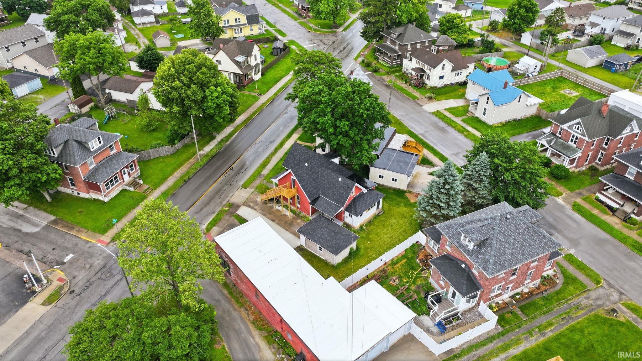 Residential neighborhood featuring mature trees and established properties