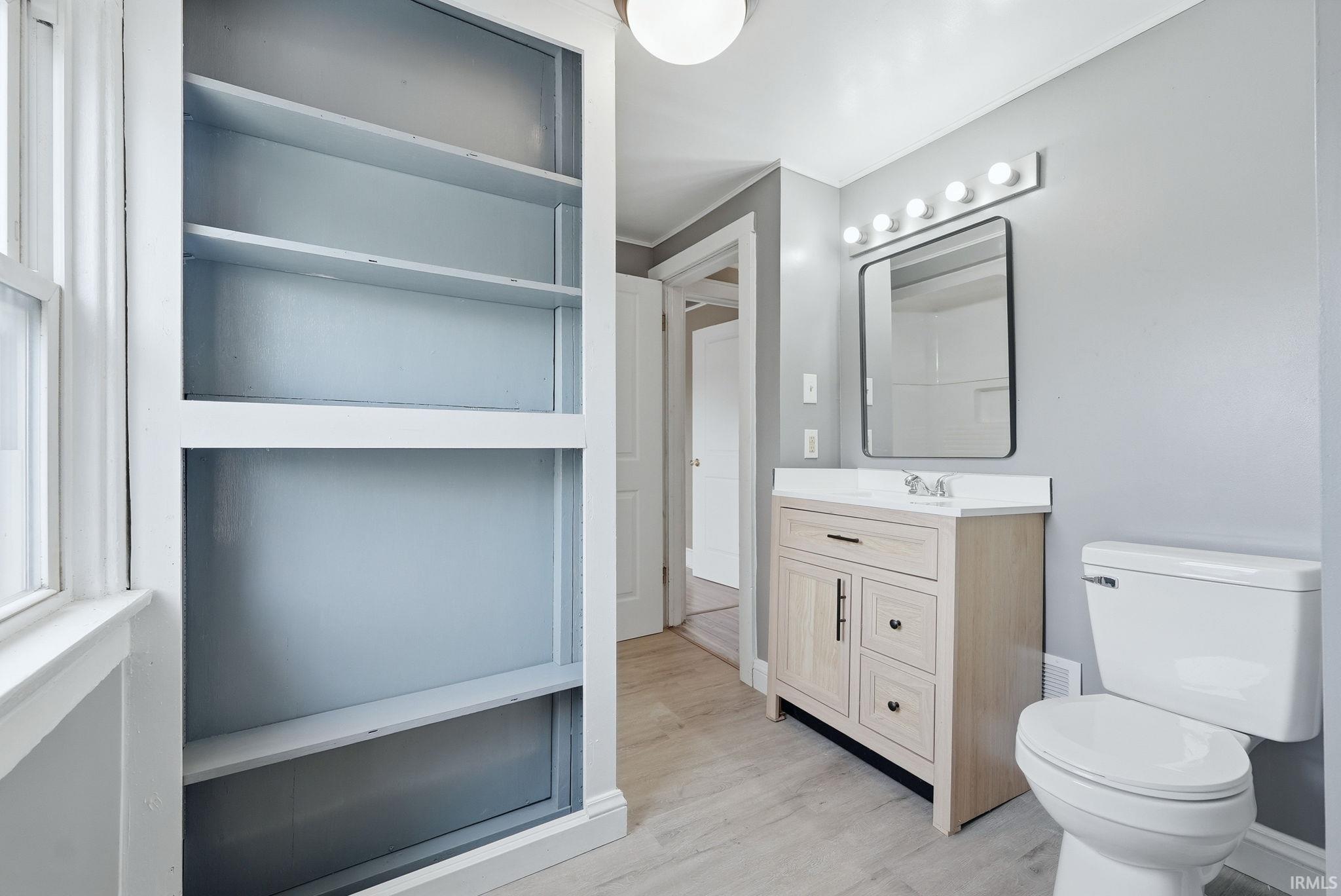 Built-in shelving unit providing storage