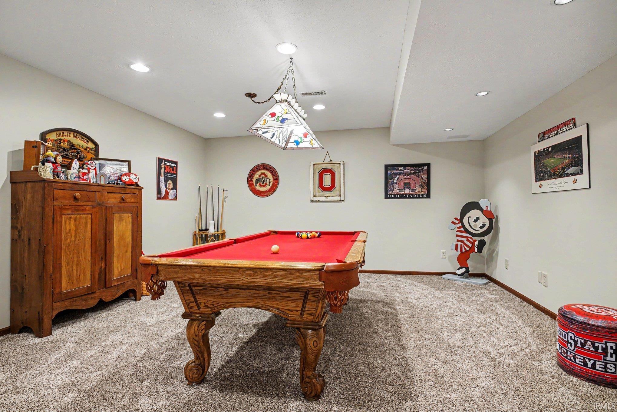 Recreational room featuring plush carpeting and recessed lighting