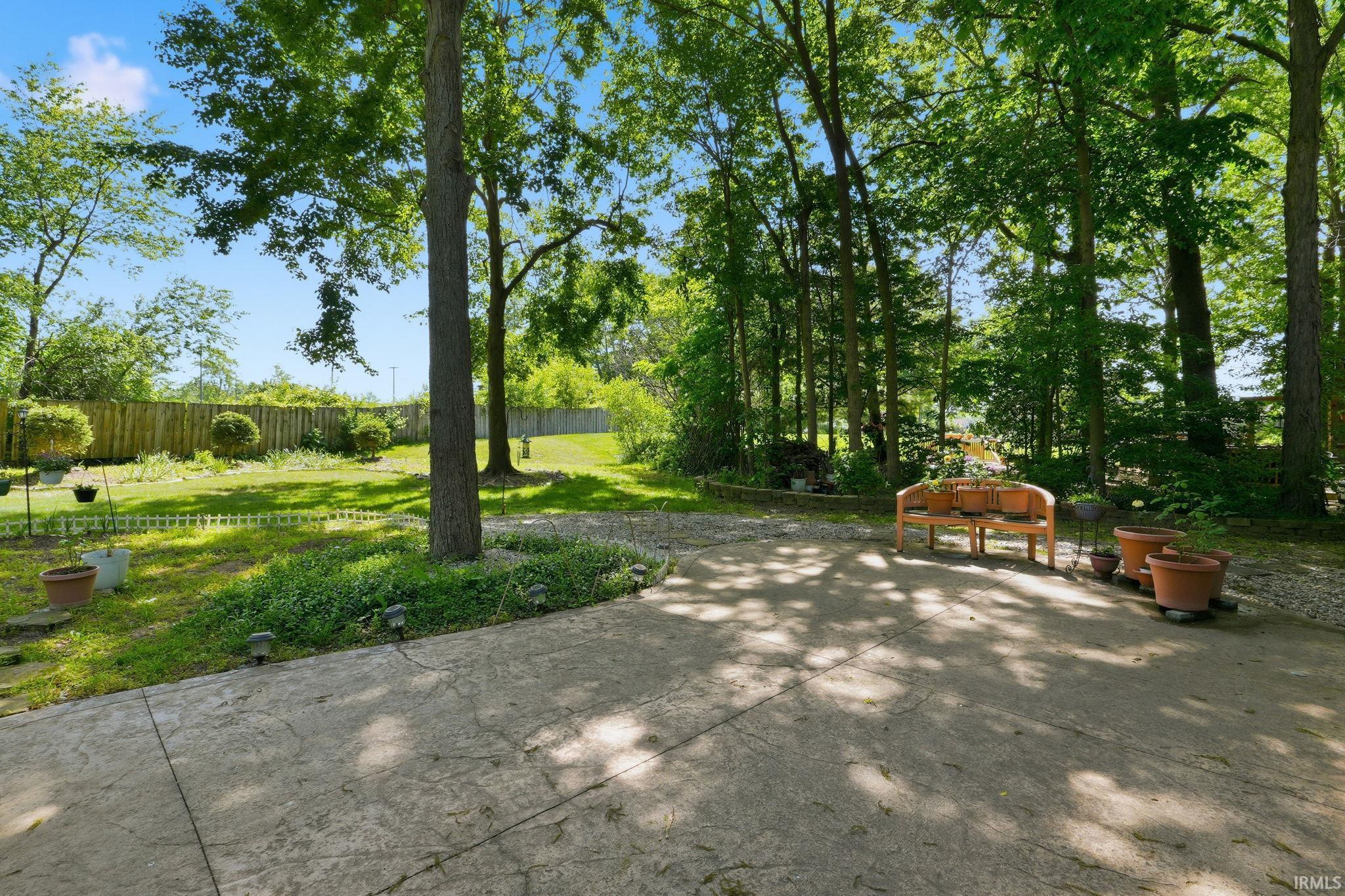 Expansive outdoor patio with a stamped concrete surface