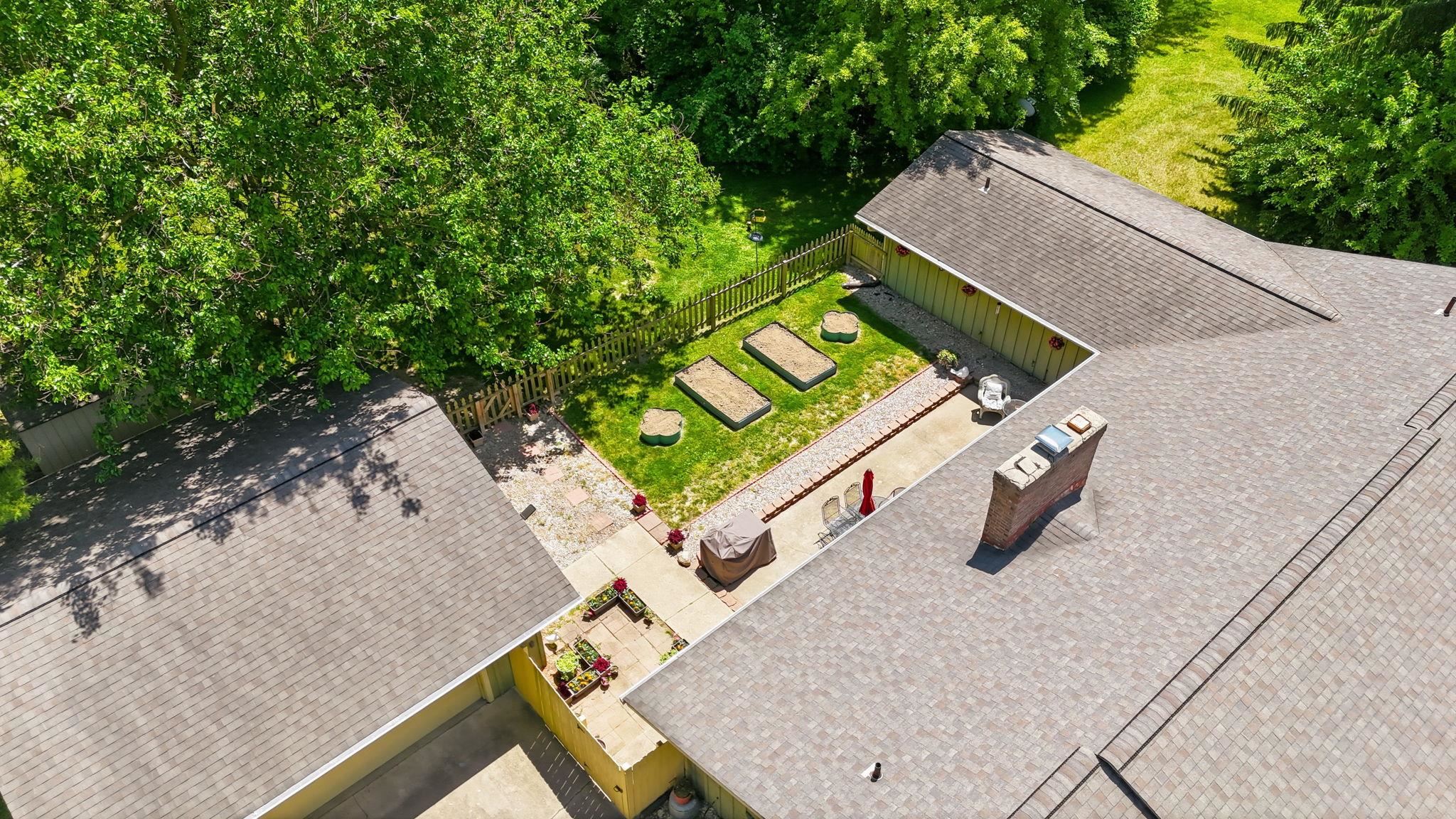 Aerial perspective showcasing shingle roofing