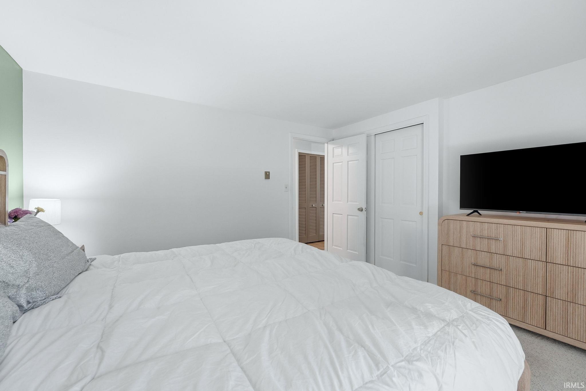 White-painted room with light green accent wall