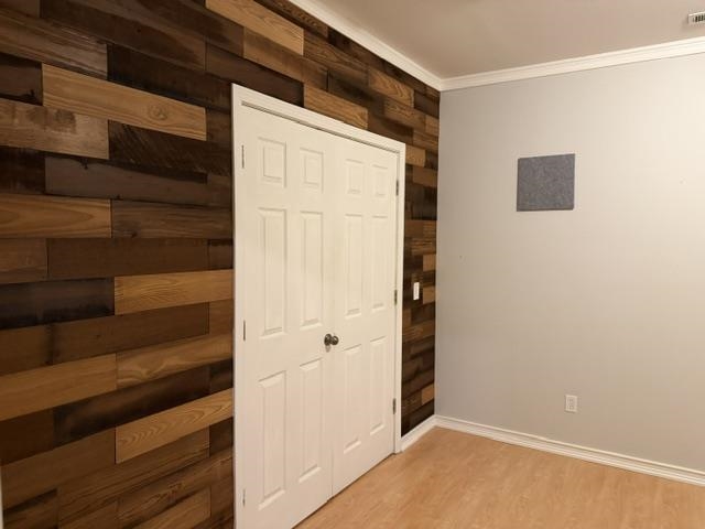 Accent wall featuring varied-tone wood planking