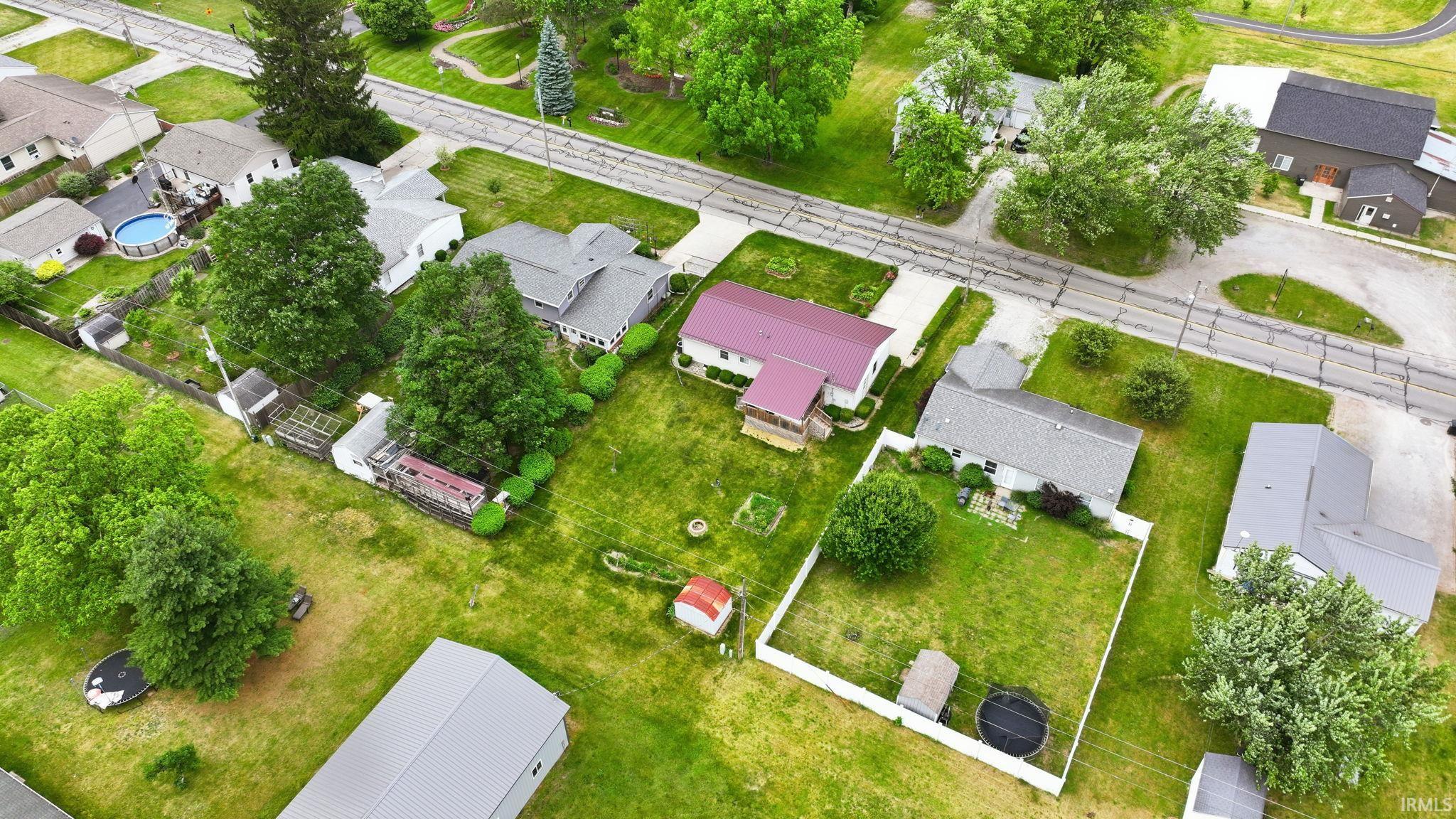 Expansive green lawns with established trees
