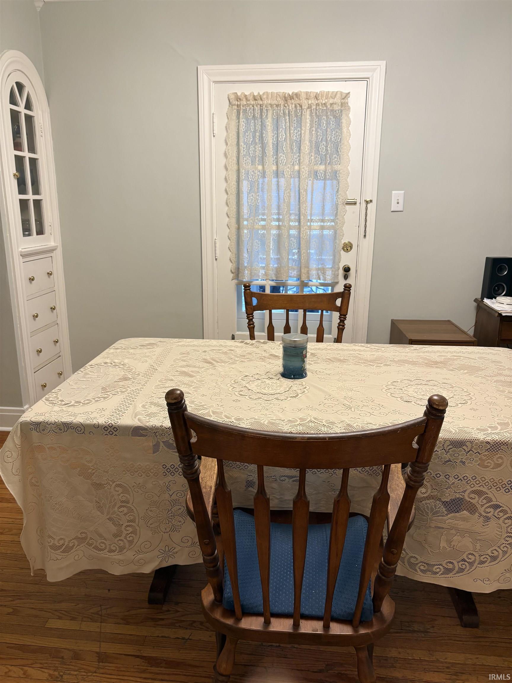Light gray wall finishes with white trim