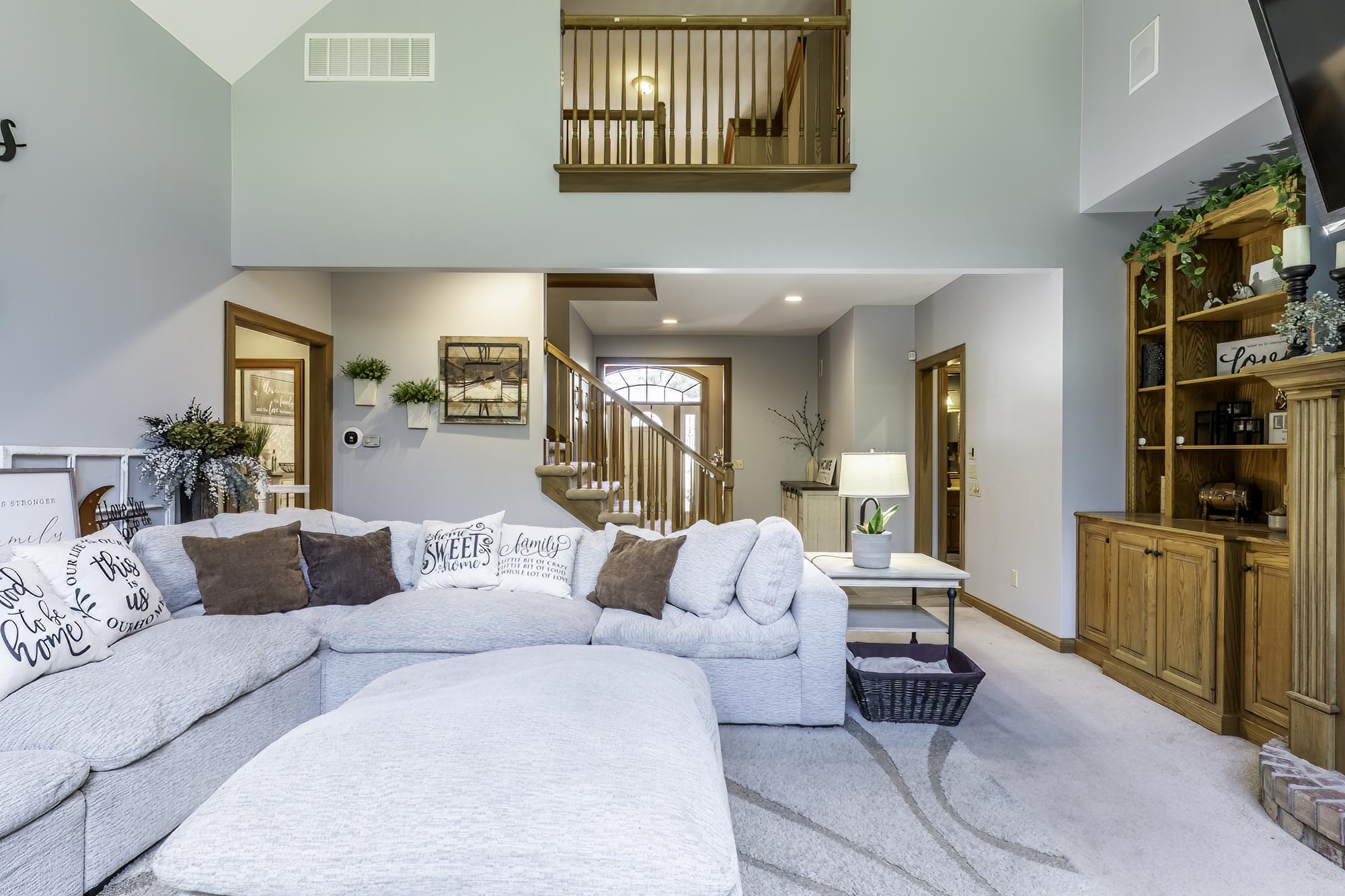 Vaulted ceilings with a second-story balcony