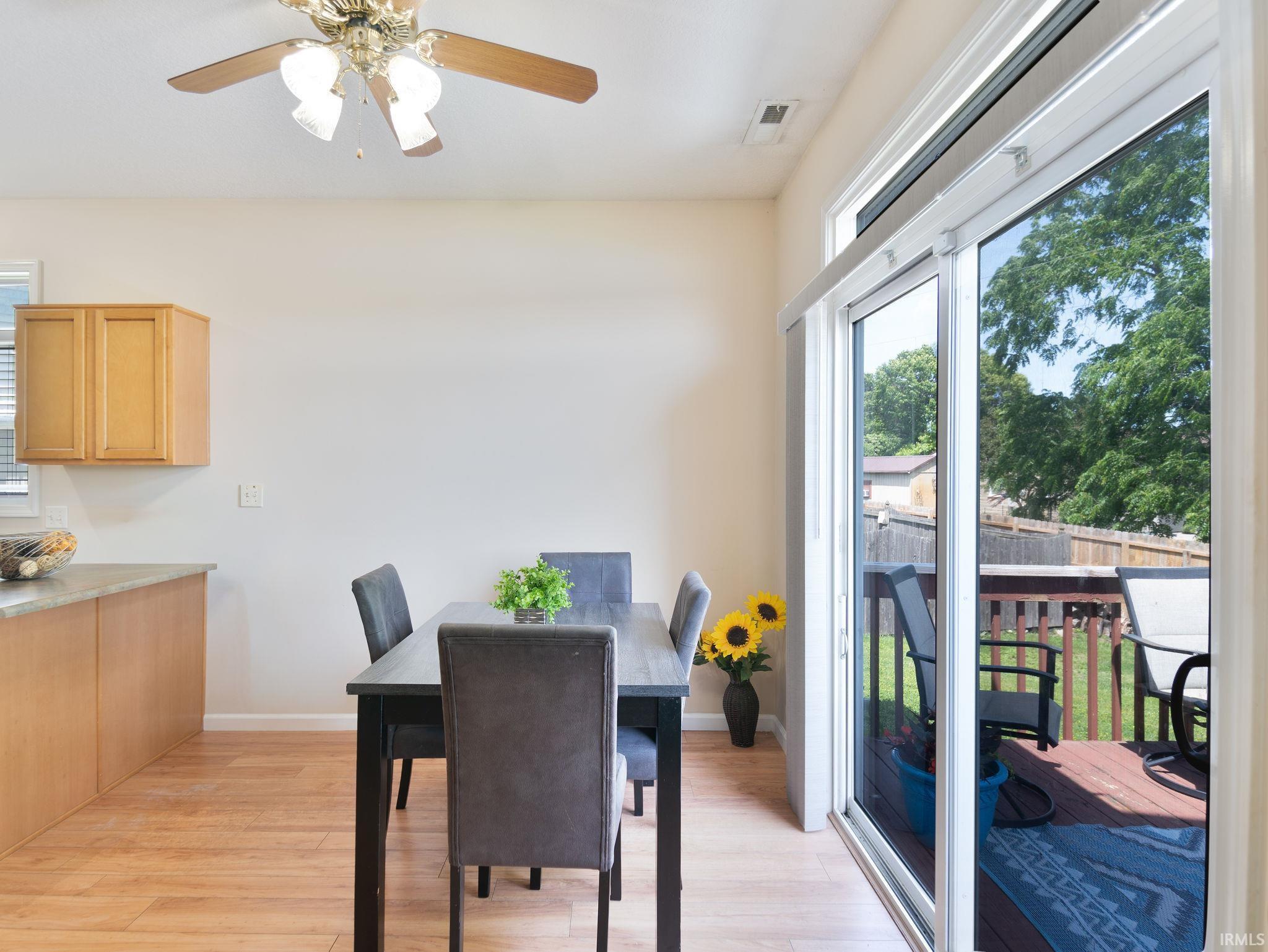 Sliding glass door opening to a private wooden deck