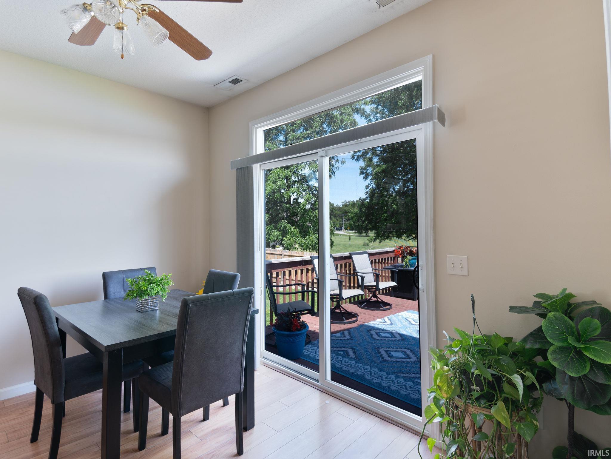 Sliding glass doors opening to an outdoor deck
