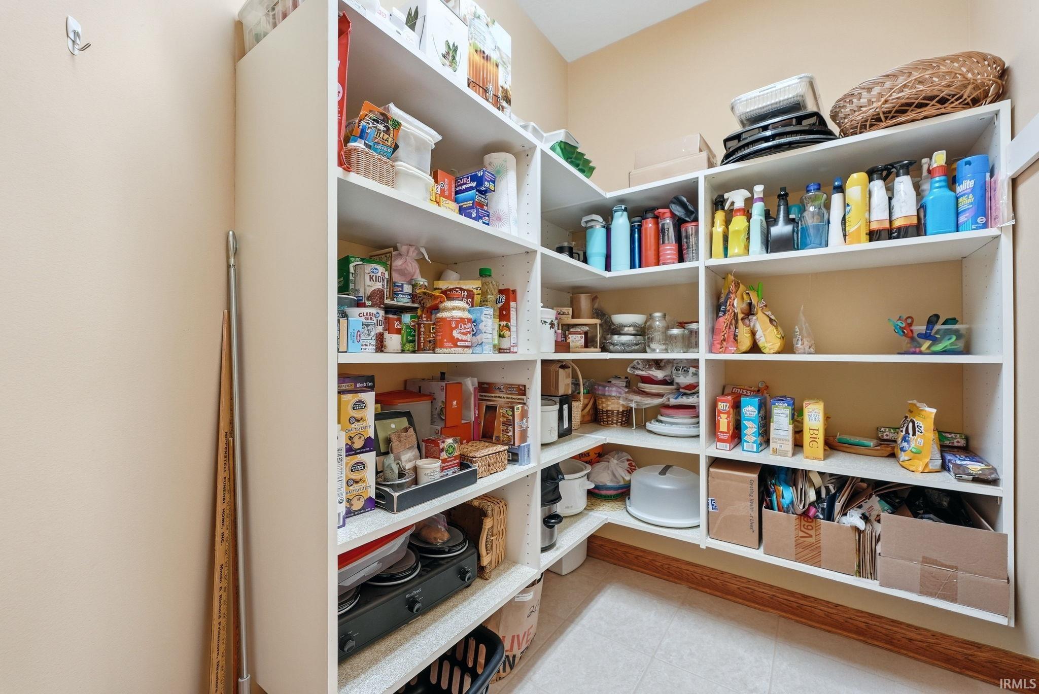 Custom-built shelving providing abundant storage