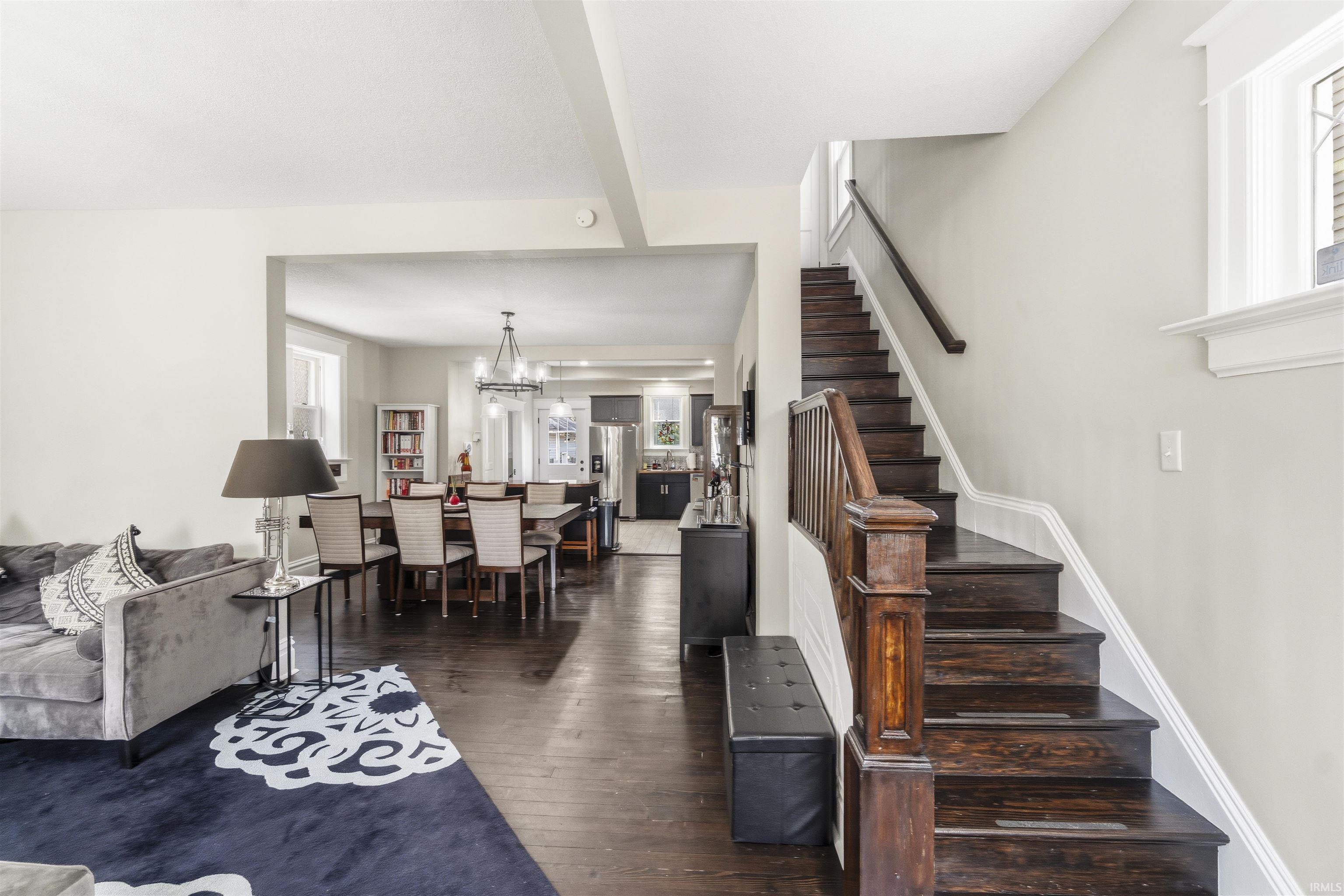 Hardwood staircase with traditional wood banister