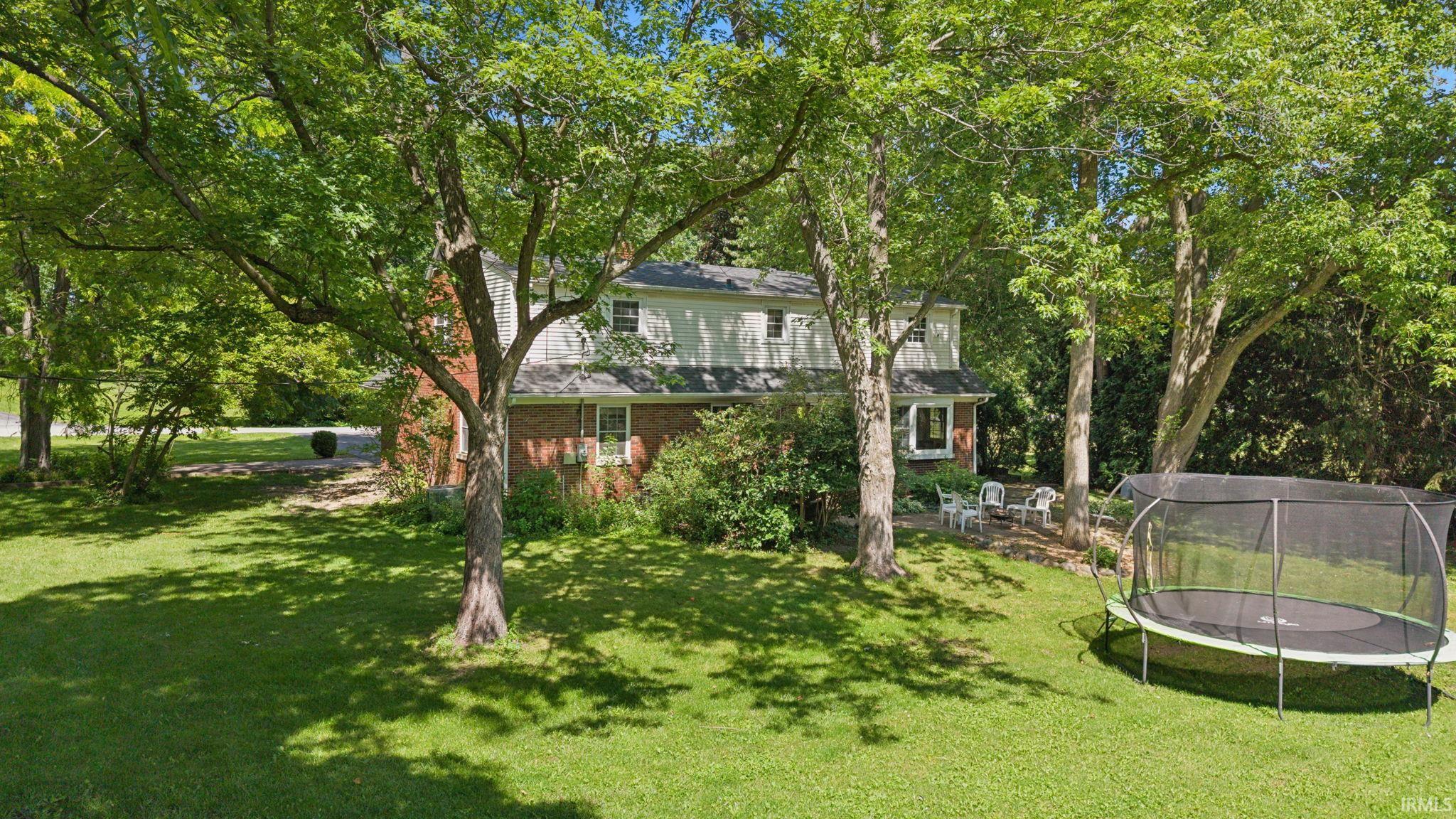 Expansive green lawn providing ample outdoor space
