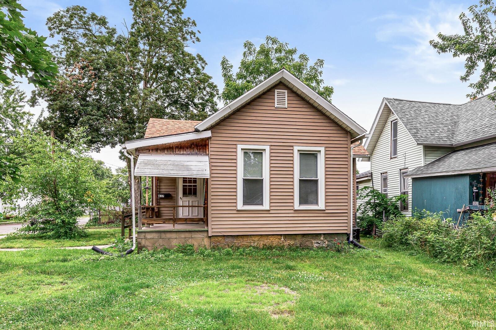 Residential property featuring horizontal siding and a front porch