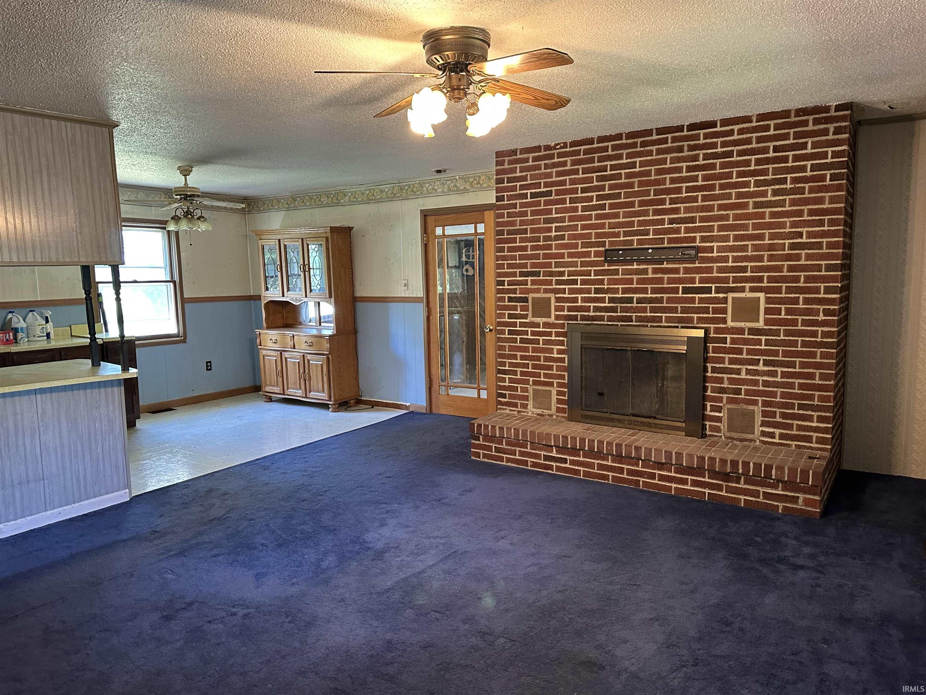 Brick fireplace with an integrated firebox and hearth