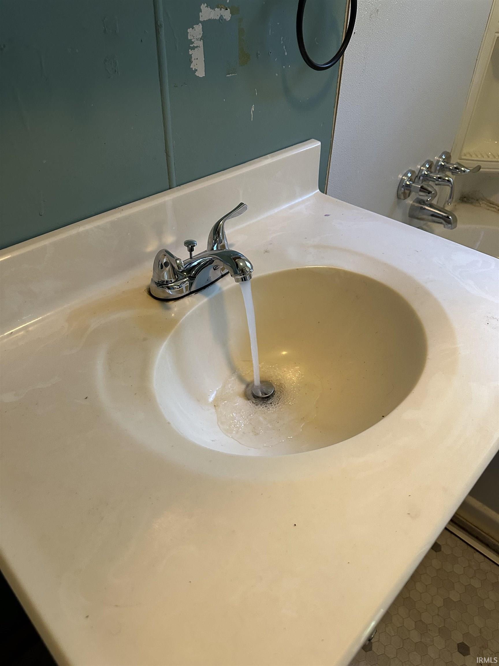 Integrated vanity sink with chrome faucet