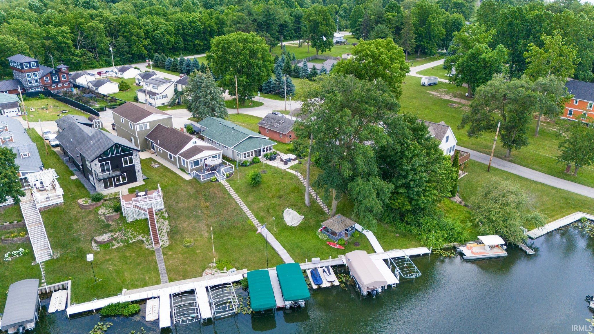 Waterfront property featuring multiple boat slips and docks