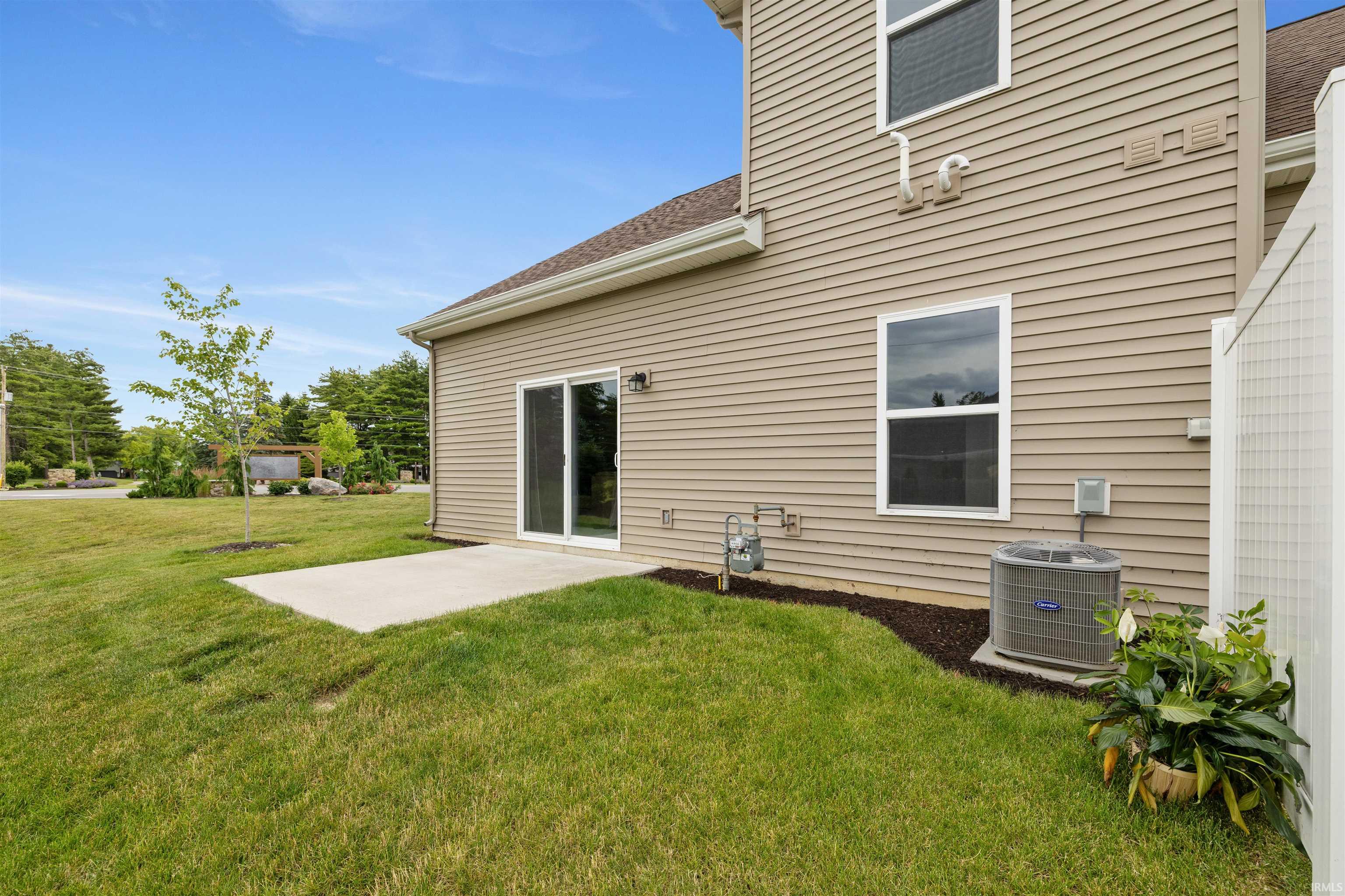 Exterior patio with sliding glass door access