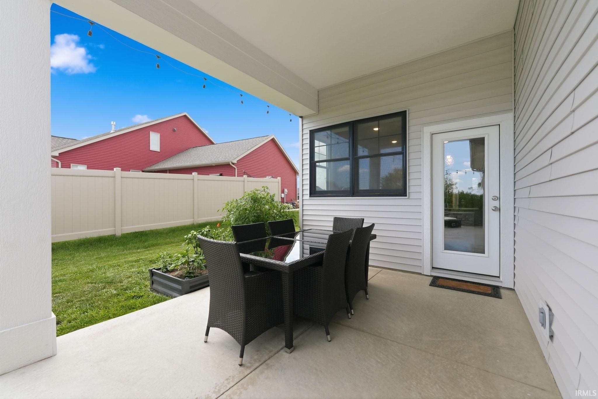 Covered patio featuring a concrete surface