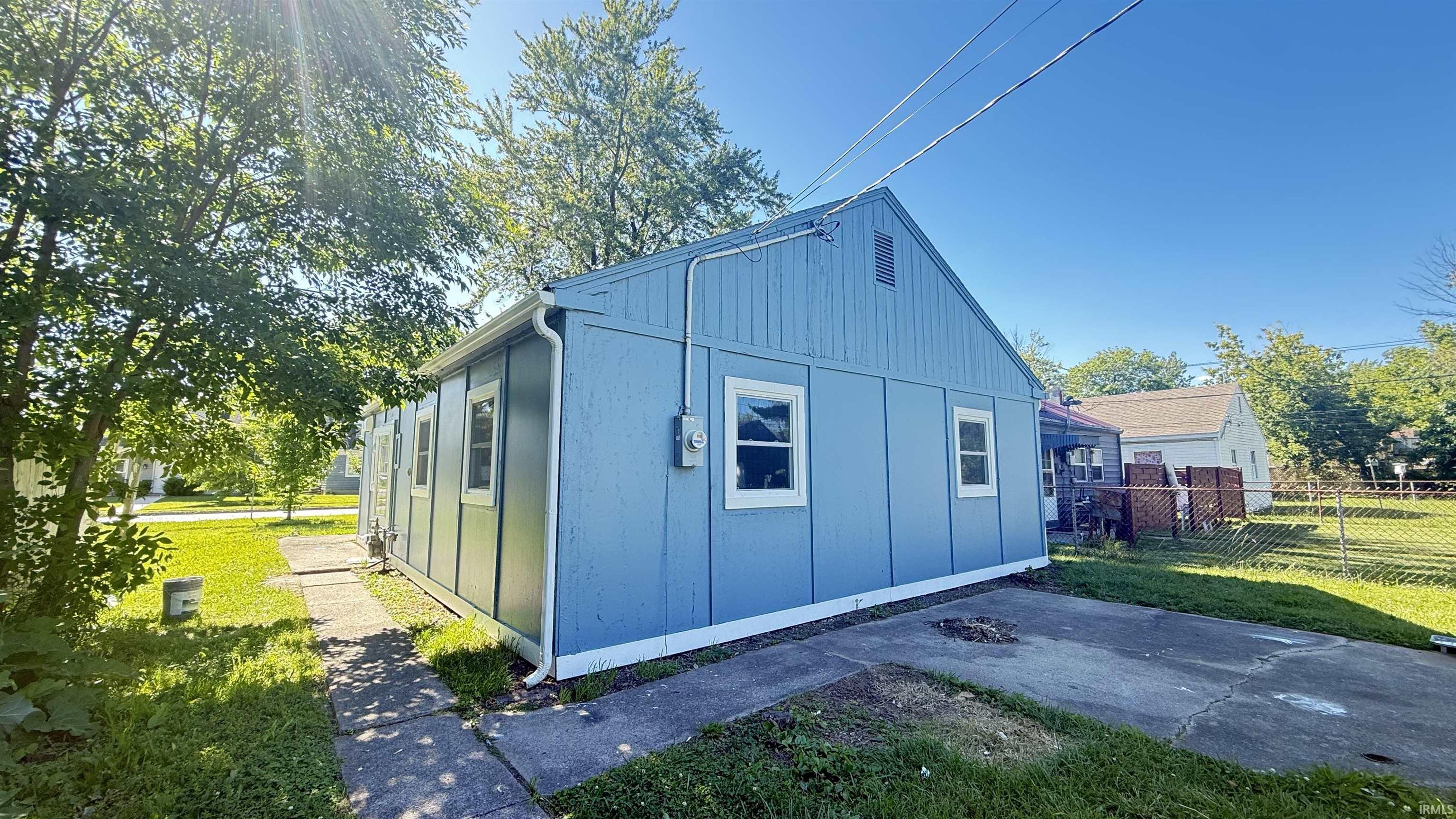 Light blue exterior siding with white trim