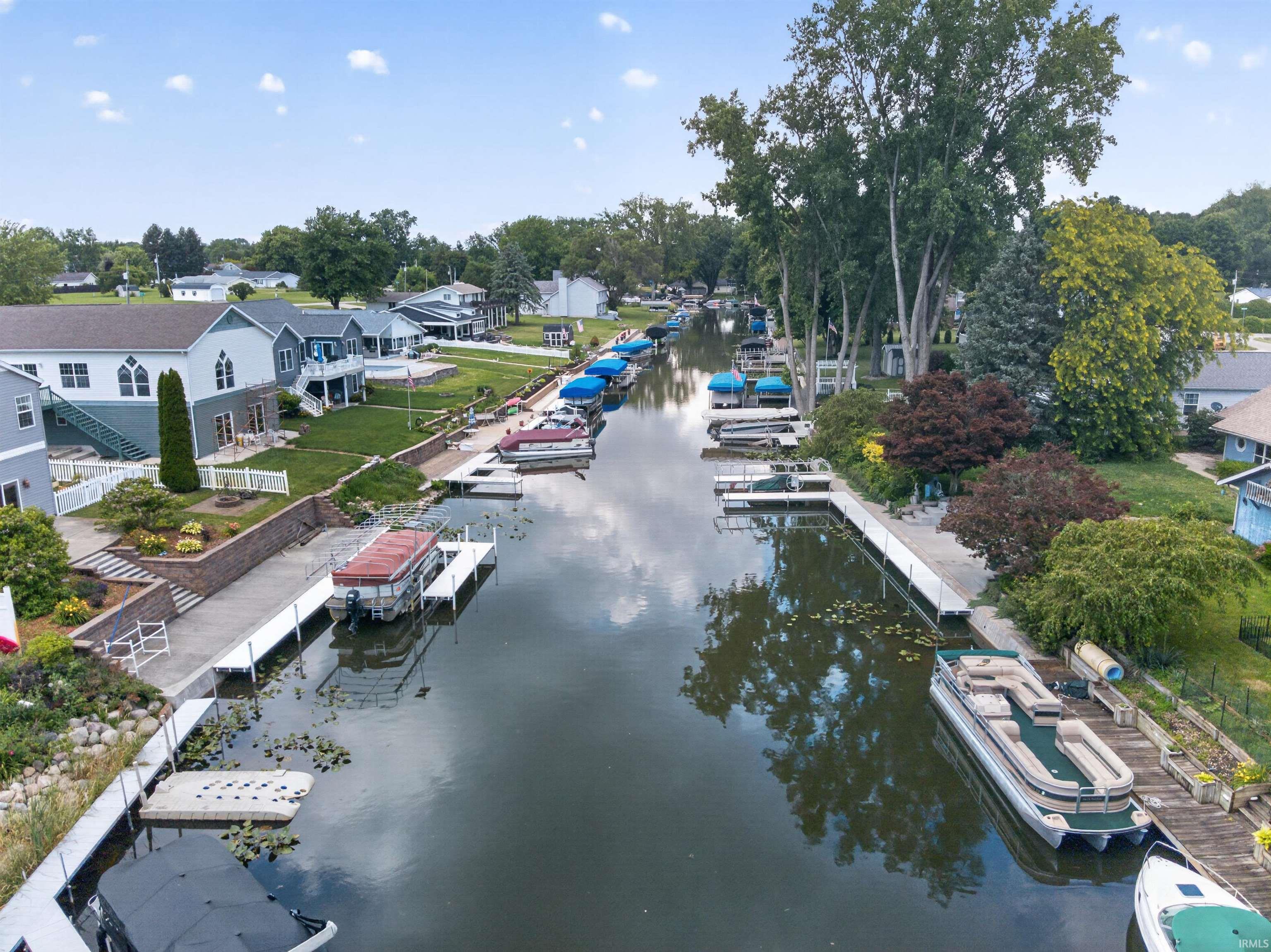 Waterfront property featuring a private boat dock and direct canal access