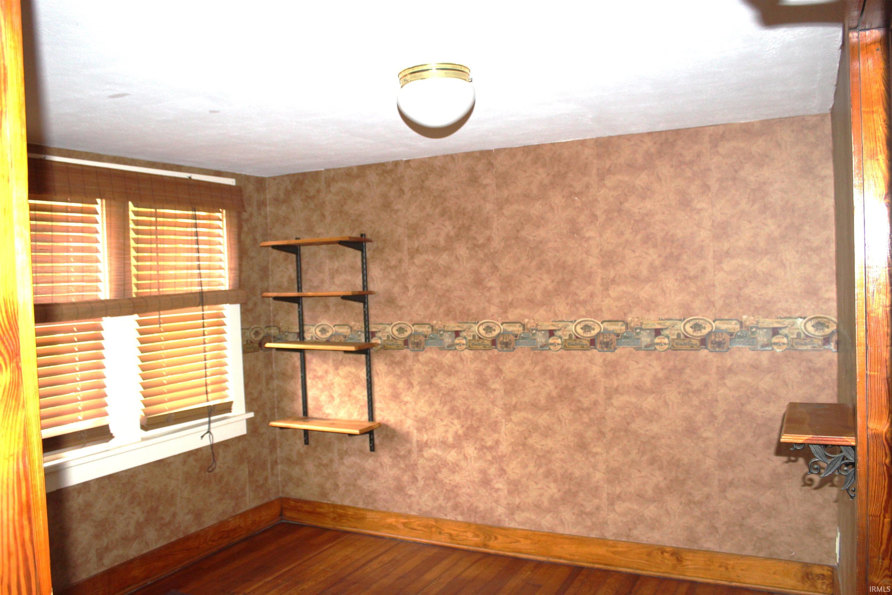 Wood-finish flooring with coordinating wood baseboards