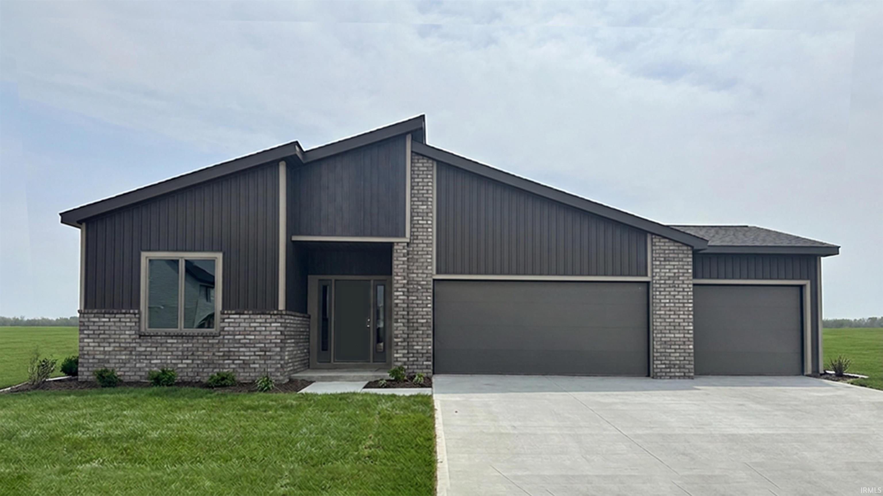 Modern contemporary exterior featuring dark vertical siding, gray brick accents, and a distinctive angled roofline