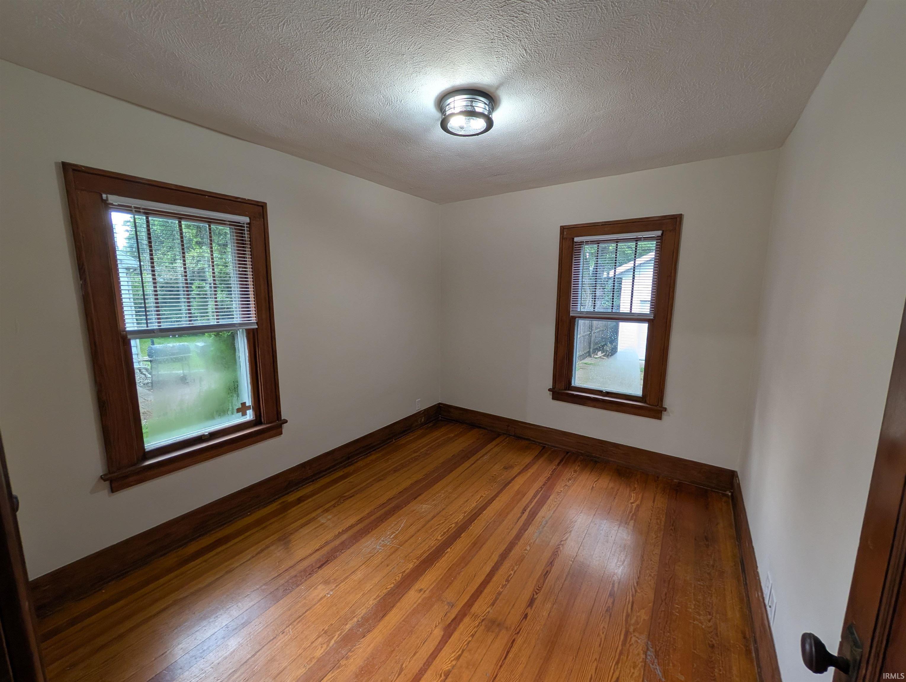 Hardwood flooring and natural wood trim throughout