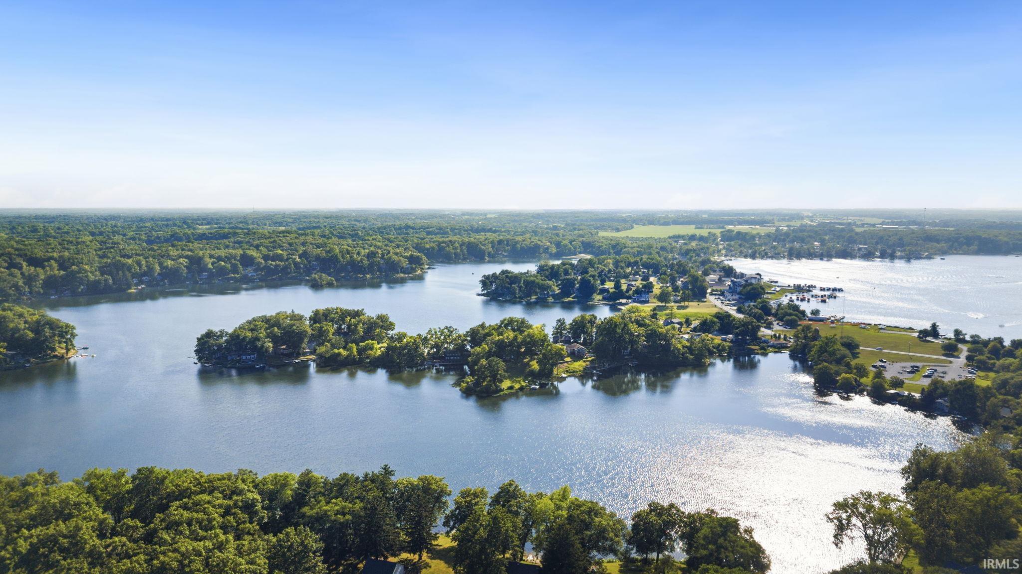 Expansive lakefront property featuring extensive shoreline, mature trees, and multiple islands