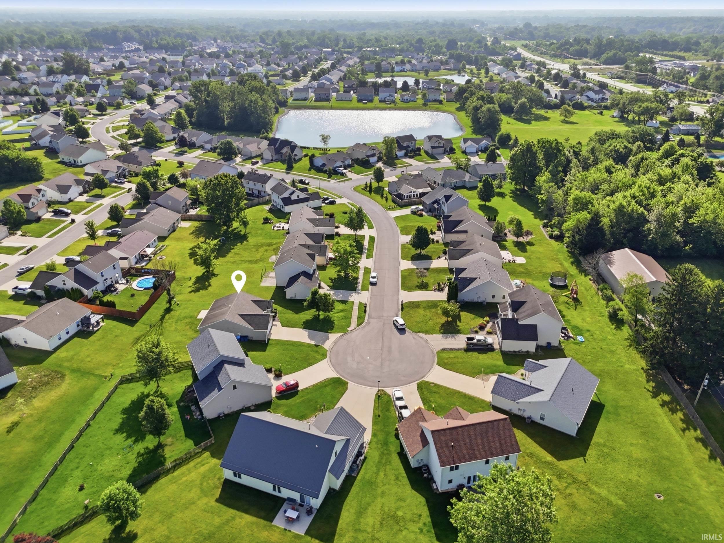 Residential neighborhood featuring single-family homes and a central cul-de-sac