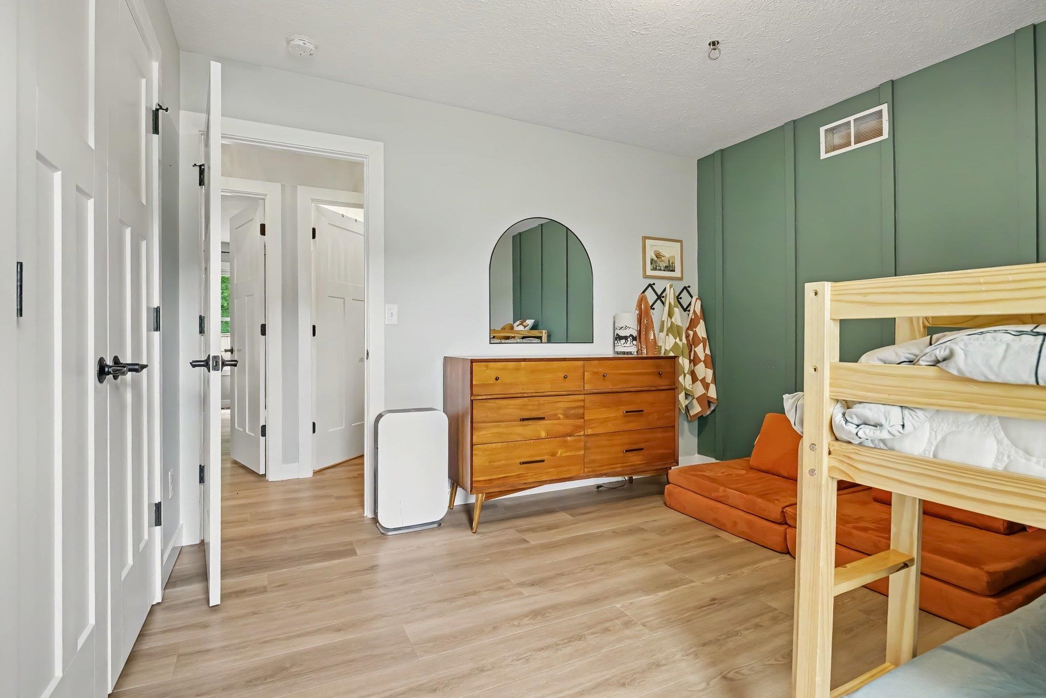 Bright interior space featuring light wood-finish flooring