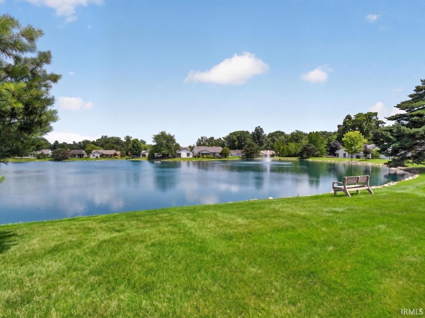 Expansive body of water featuring a central fountain