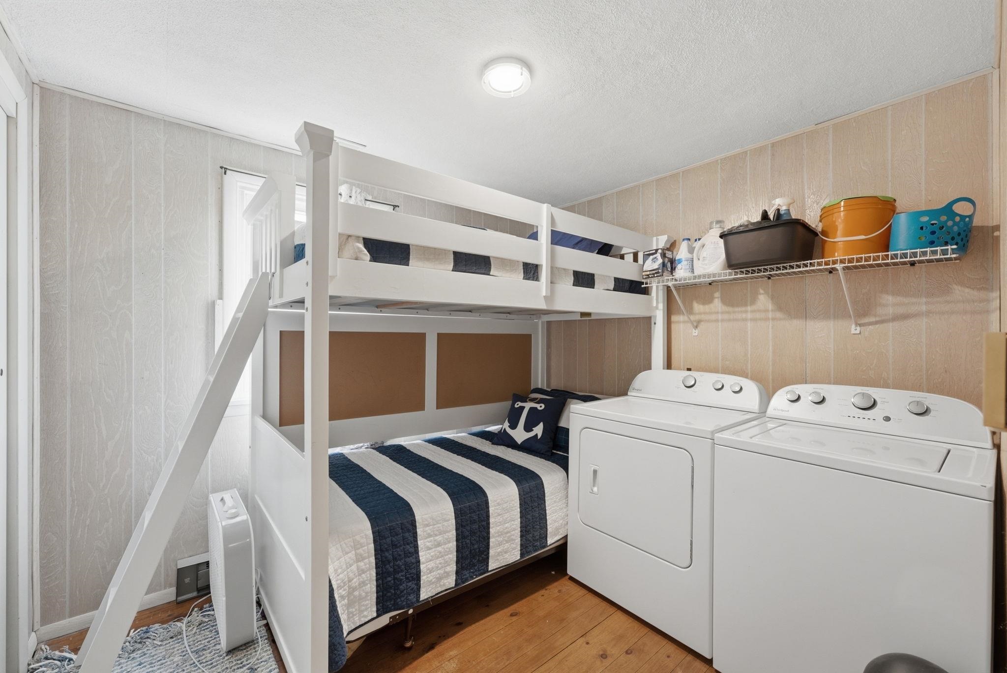 Bedroom 3 has bunk beds and double closets with finish wood flooring Dedicated laundry area featuring a washer and dryer can be relocated to lower level. Homeowners choice to have it on upper level