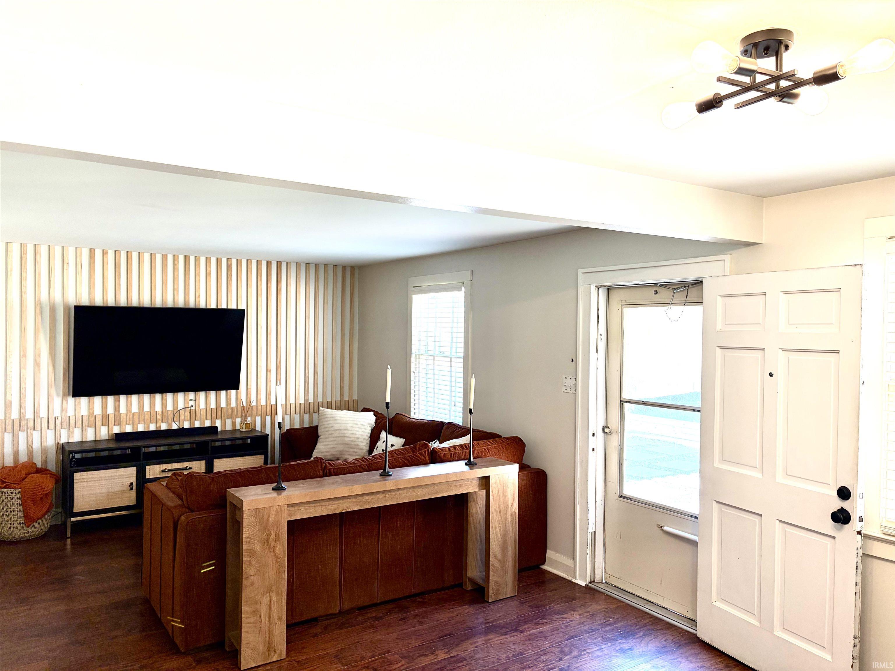 Accent wall with vertical wood paneling