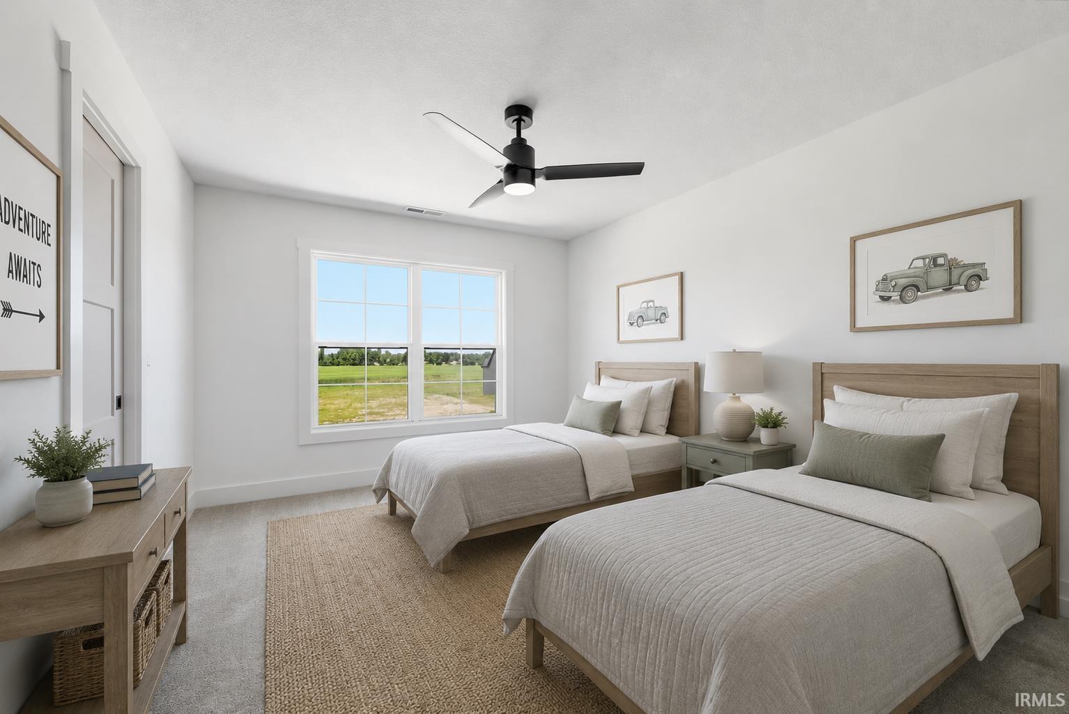 Bedroom featuring a ceiling fan with integrated lighting, a large window offering expansive outdoor scenery, white walls, and wood-finish flooring