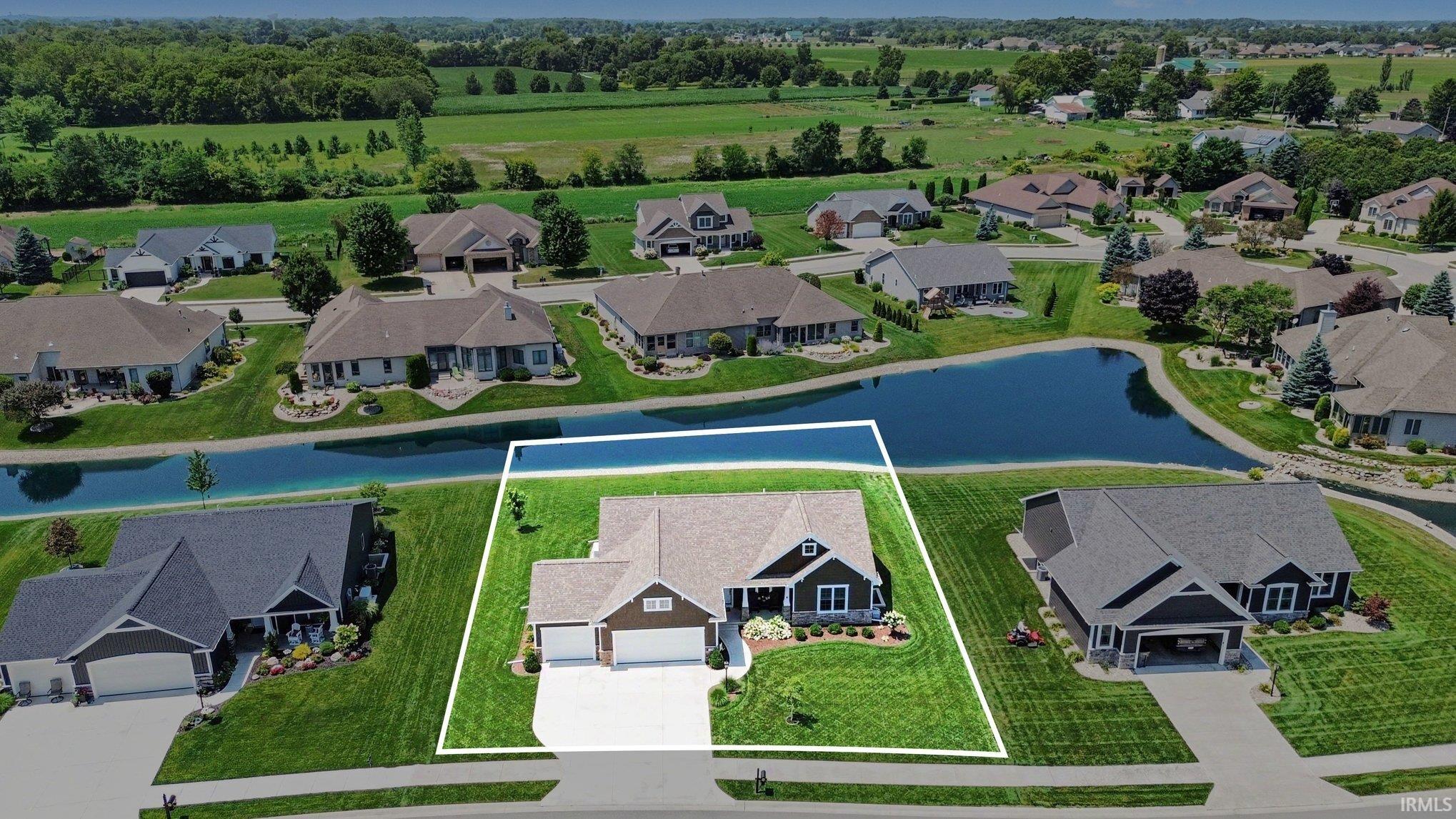 Single-story residence featuring a two-car garage, front landscaping, and a defined lot
