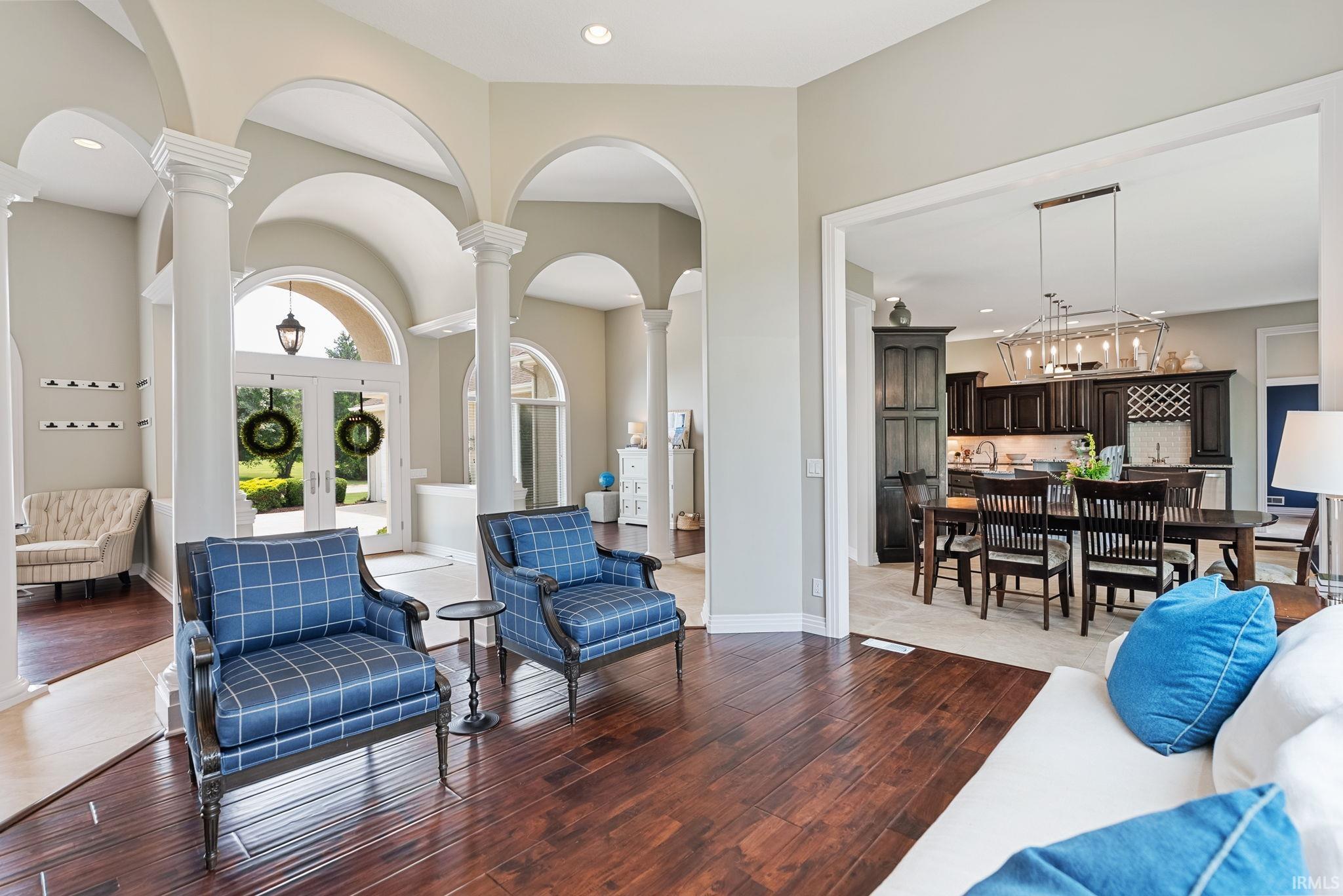 Rich wood-finish flooring extending through the living area