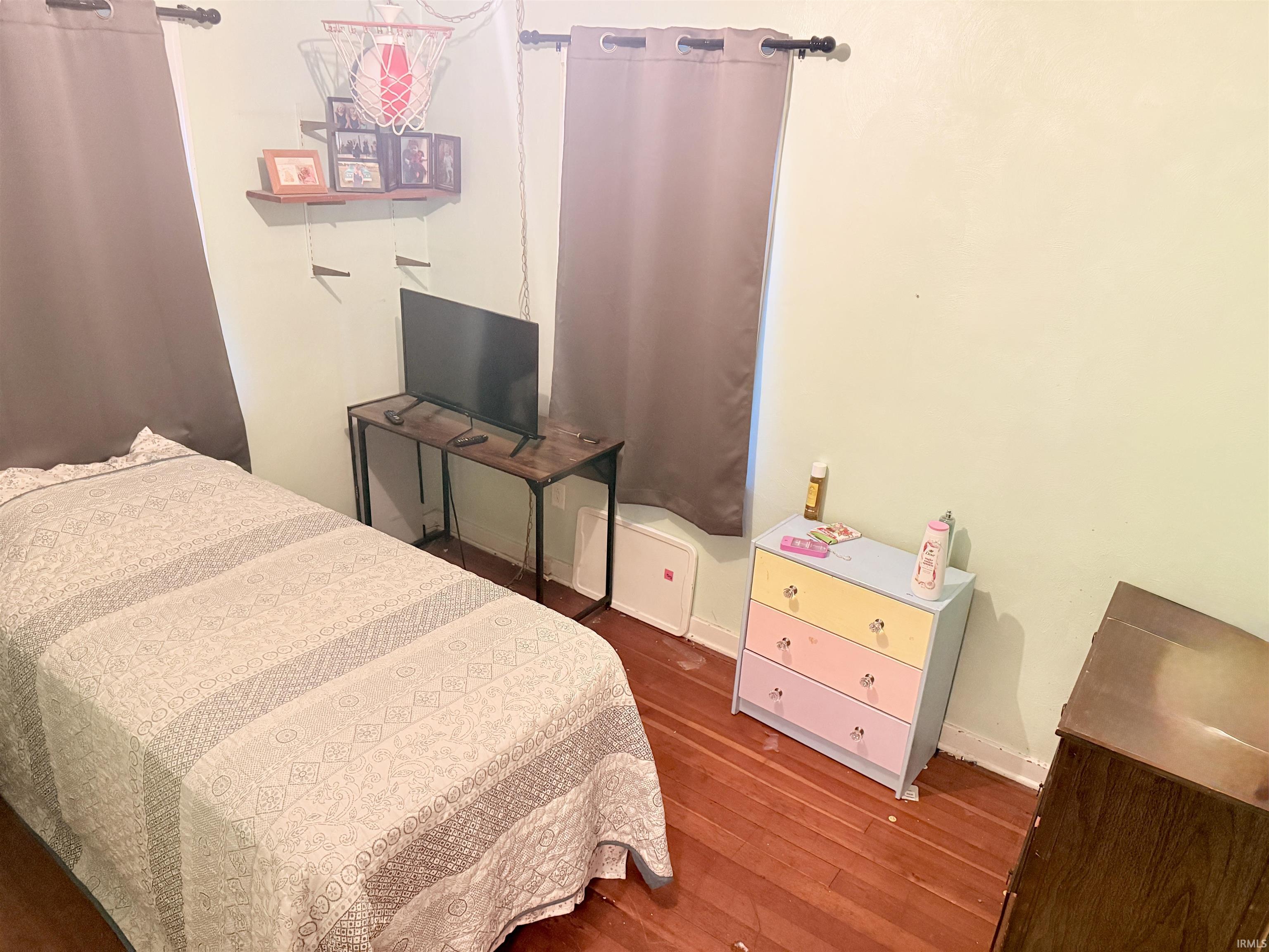 Hardwood flooring provides a warm foundation for this space