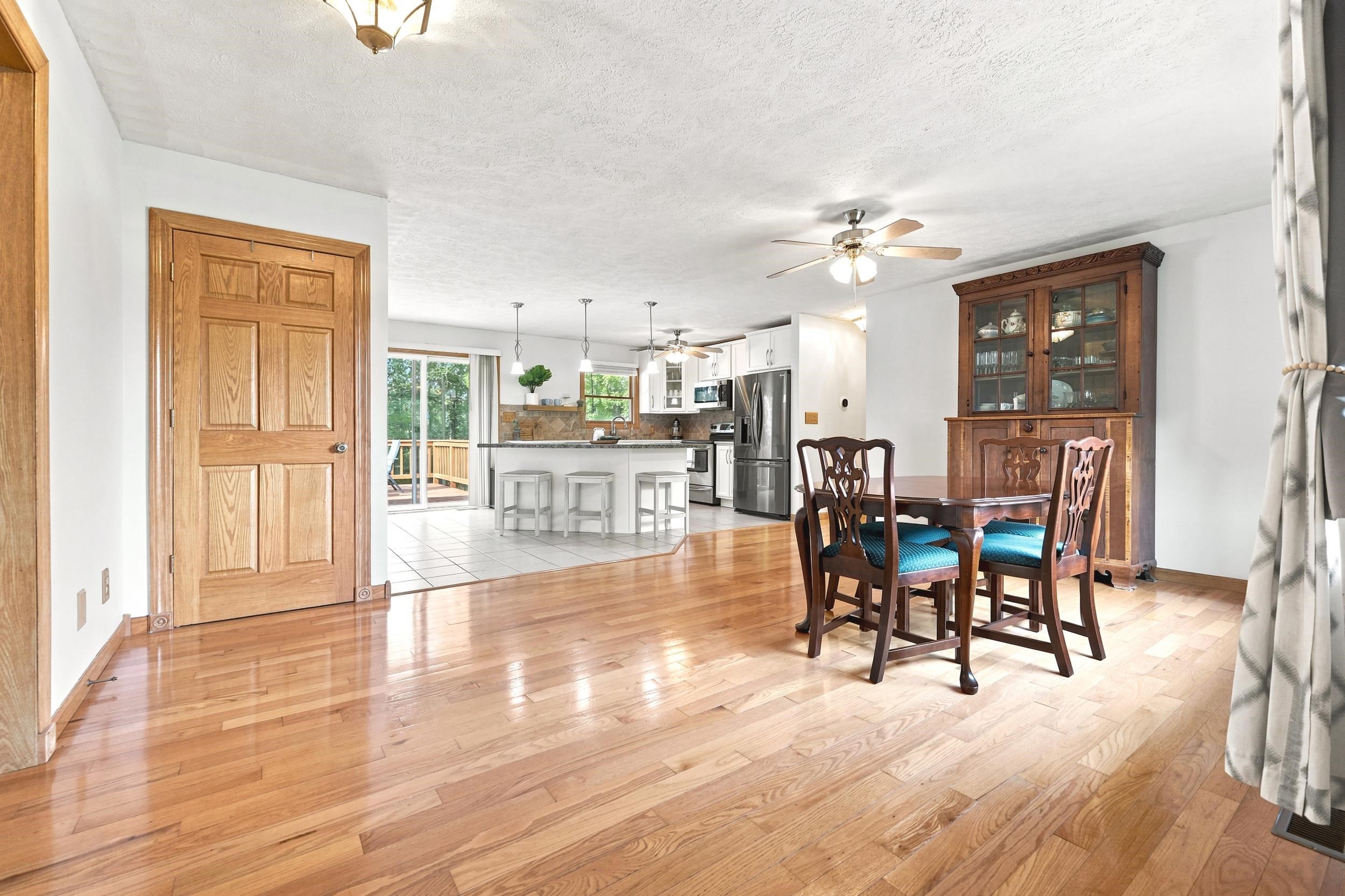 Expansive main living area featuring wood-finish flooring