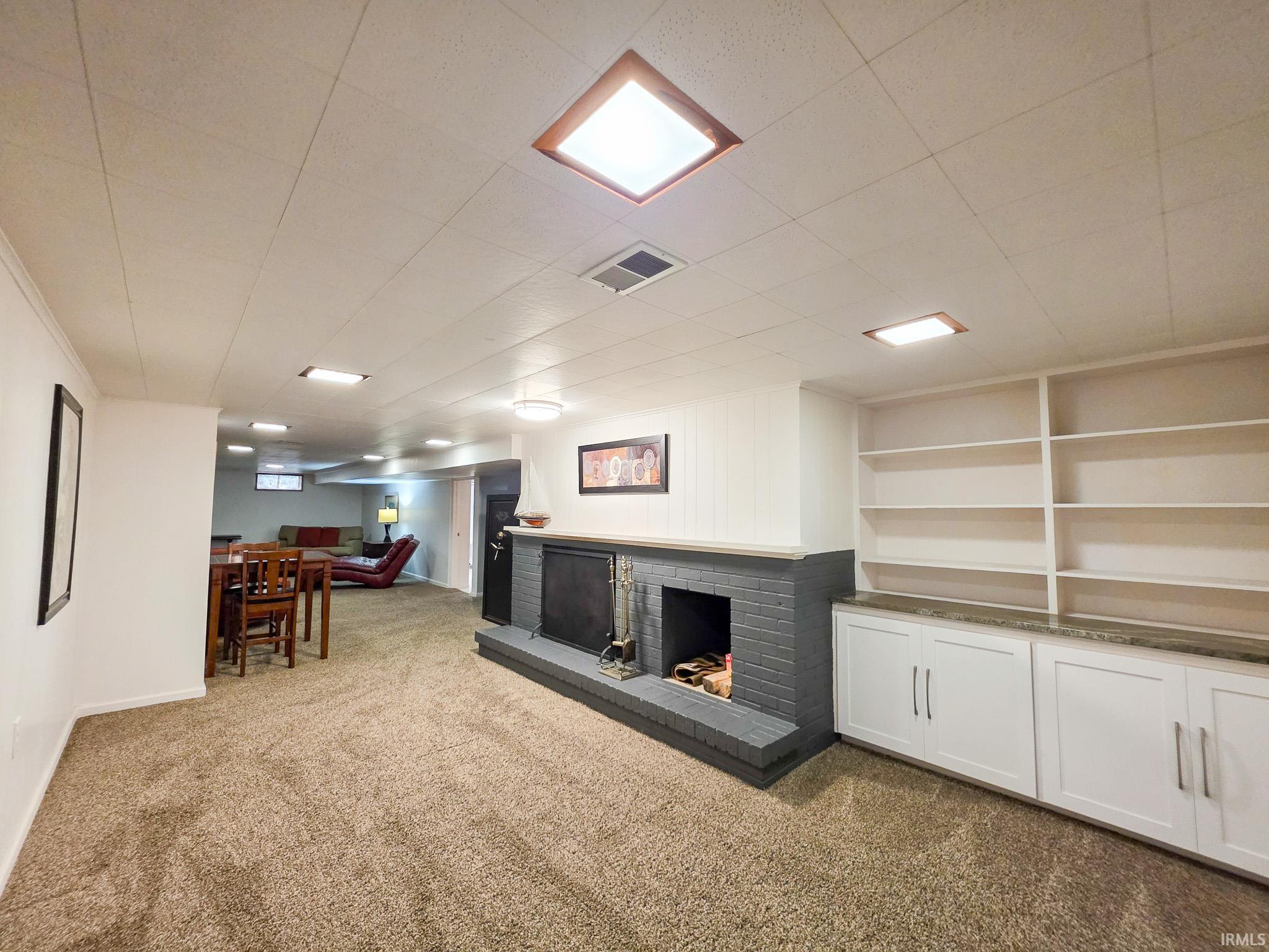 Fireplace & built ins in the lower level living area