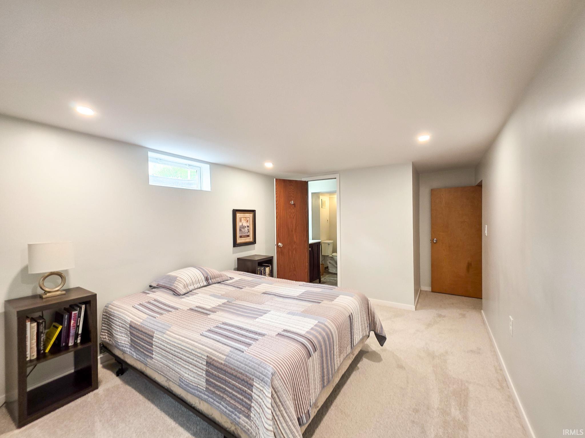 4th Bedroom with egress window and ensuite bathroom