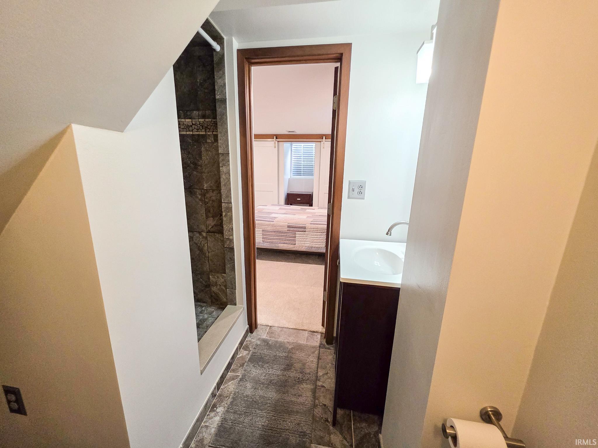 Renovated 2nd full bathroom with tile floor & tile shower