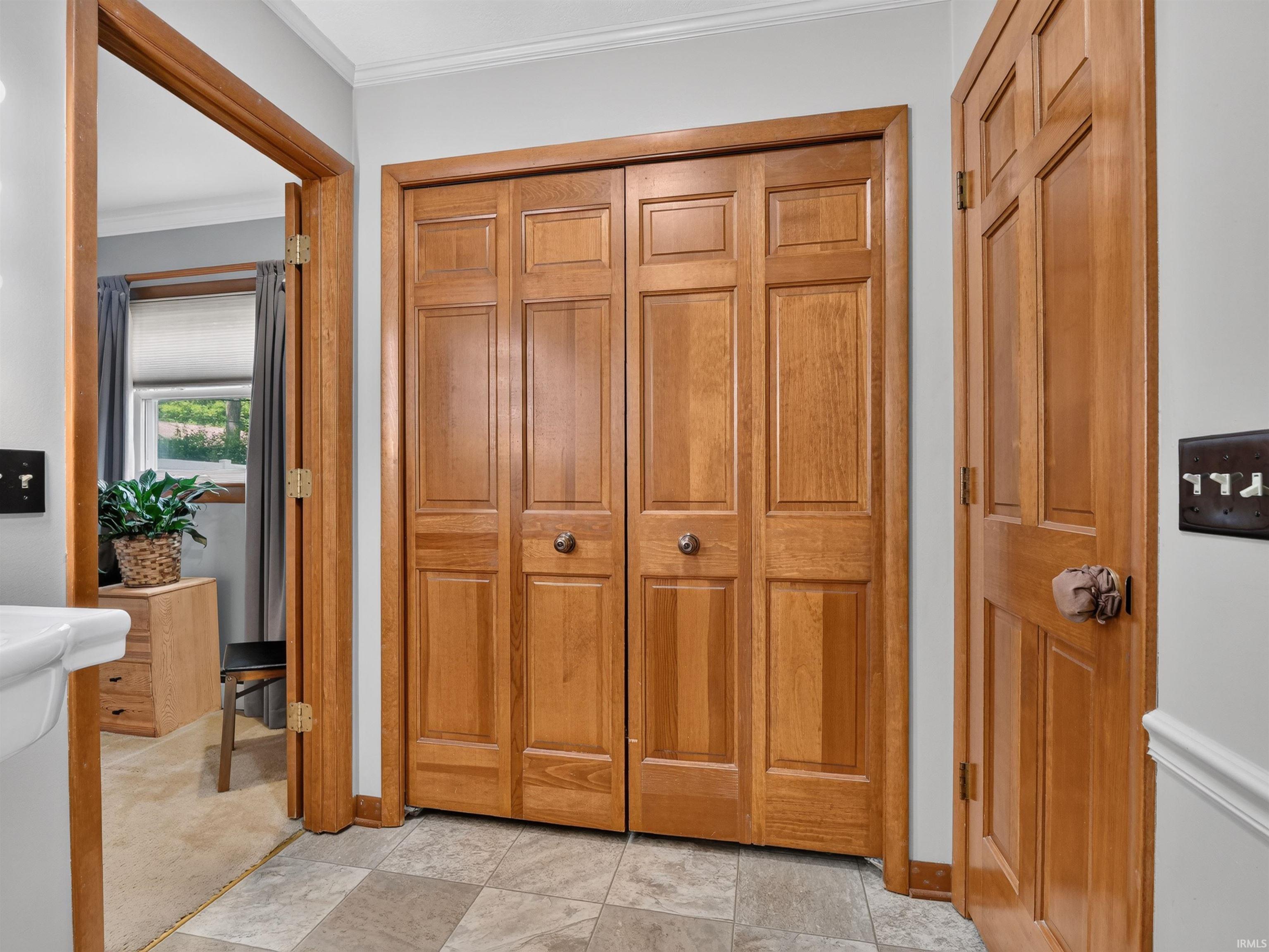 Wood-panel bifold closet doors