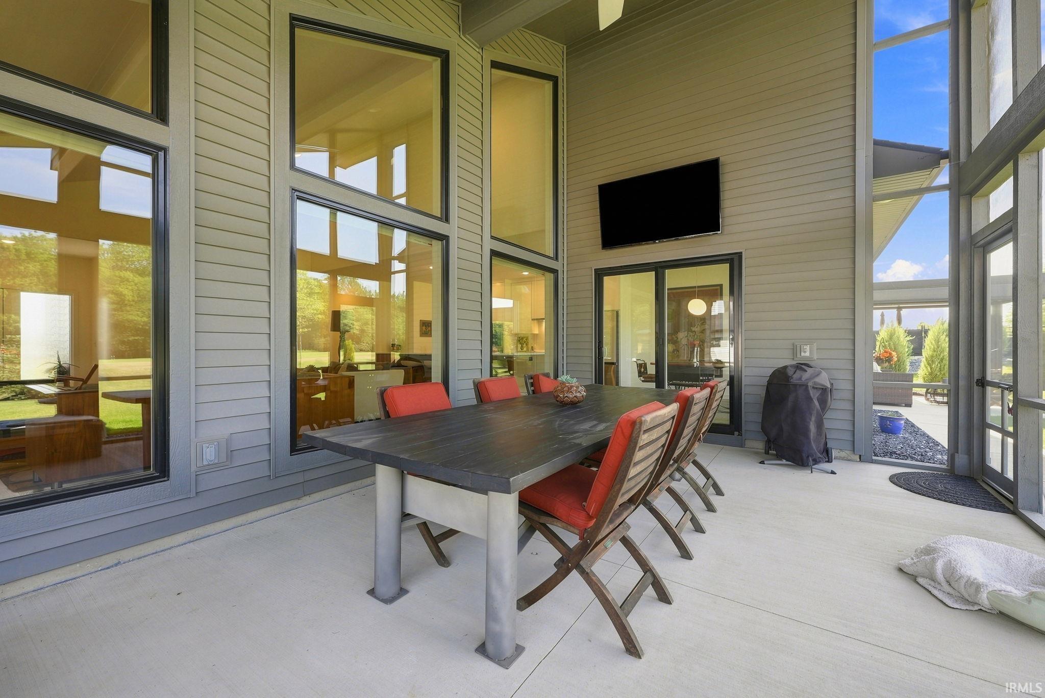 Spacious outdoor patio with durable concrete flooring