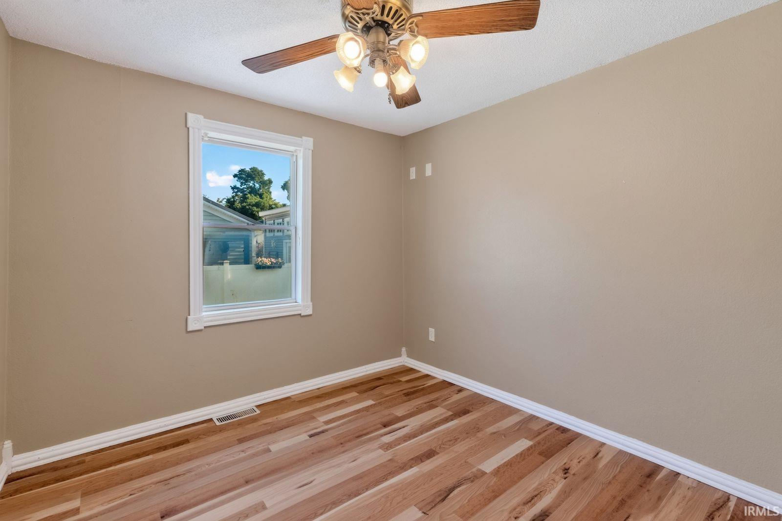 Wood-finish flooring throughout